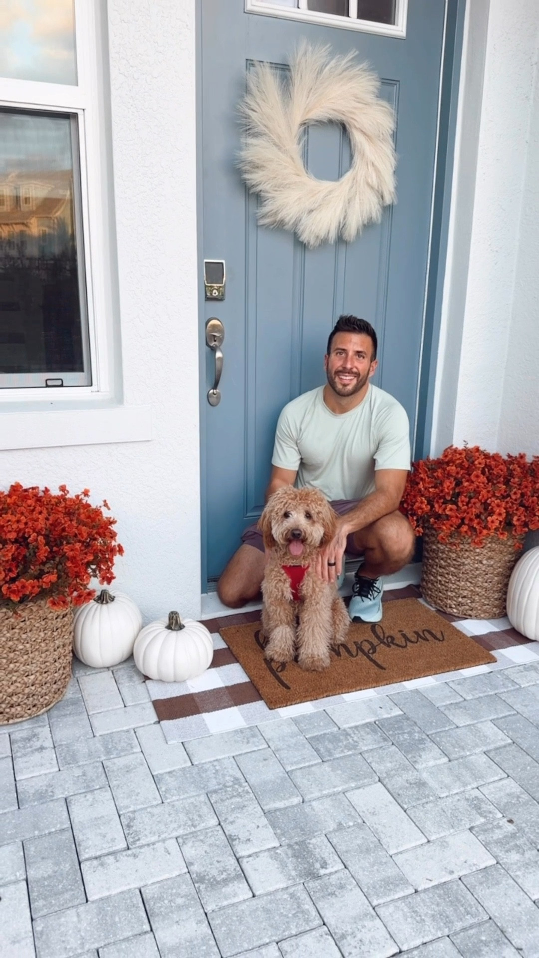 Fall Porch + Fall Patio Decor - Artificial Mums styled in a woven basket with artificial white pumpkins, a plaid mat, seasonal pumpkin welcome mat, + a cream pampas wreath for the front door.

The fake pumpkins come as orange pumpkins in various sizes. The artificial mums also come in a variety of fall colors.

This only took me a few minutes to put together and decorate our front porch/ patio. I arranged the mums into the styrofoam and then placed each set in a basket.

This is an easy + cozy way to decorate your home for fall!

#LTKSeasonal #LTKHome #LTKFindsUnder50