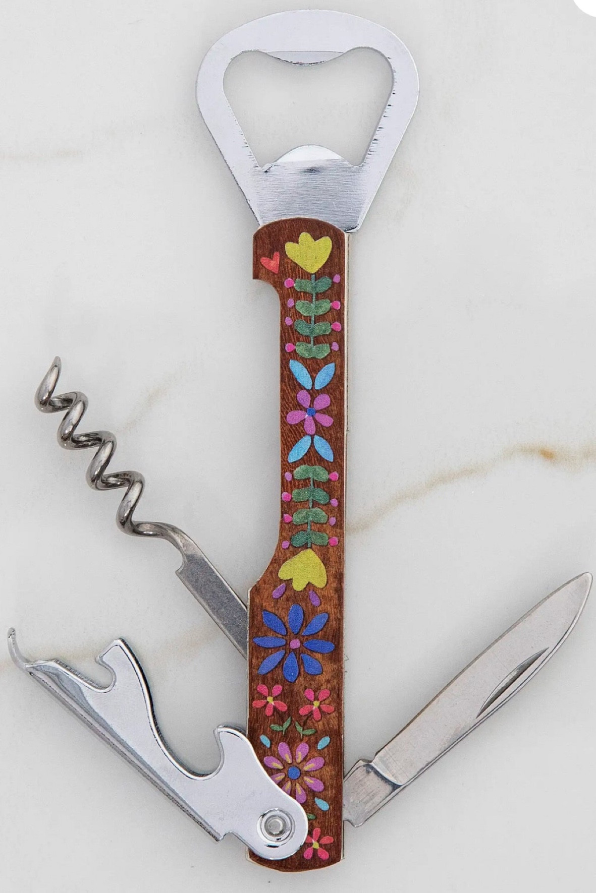 🍷✨ Uncork the boho magic with this enchanting hippie wine opener from Natural Life. 

For free-spirited, busy moms in their 40s who appreciate the finer things. 
#BohoMoms #WineTime #NaturalLife #HippieStyle"

#LTKGiftGuide #LTKHoliday #LTKhome
