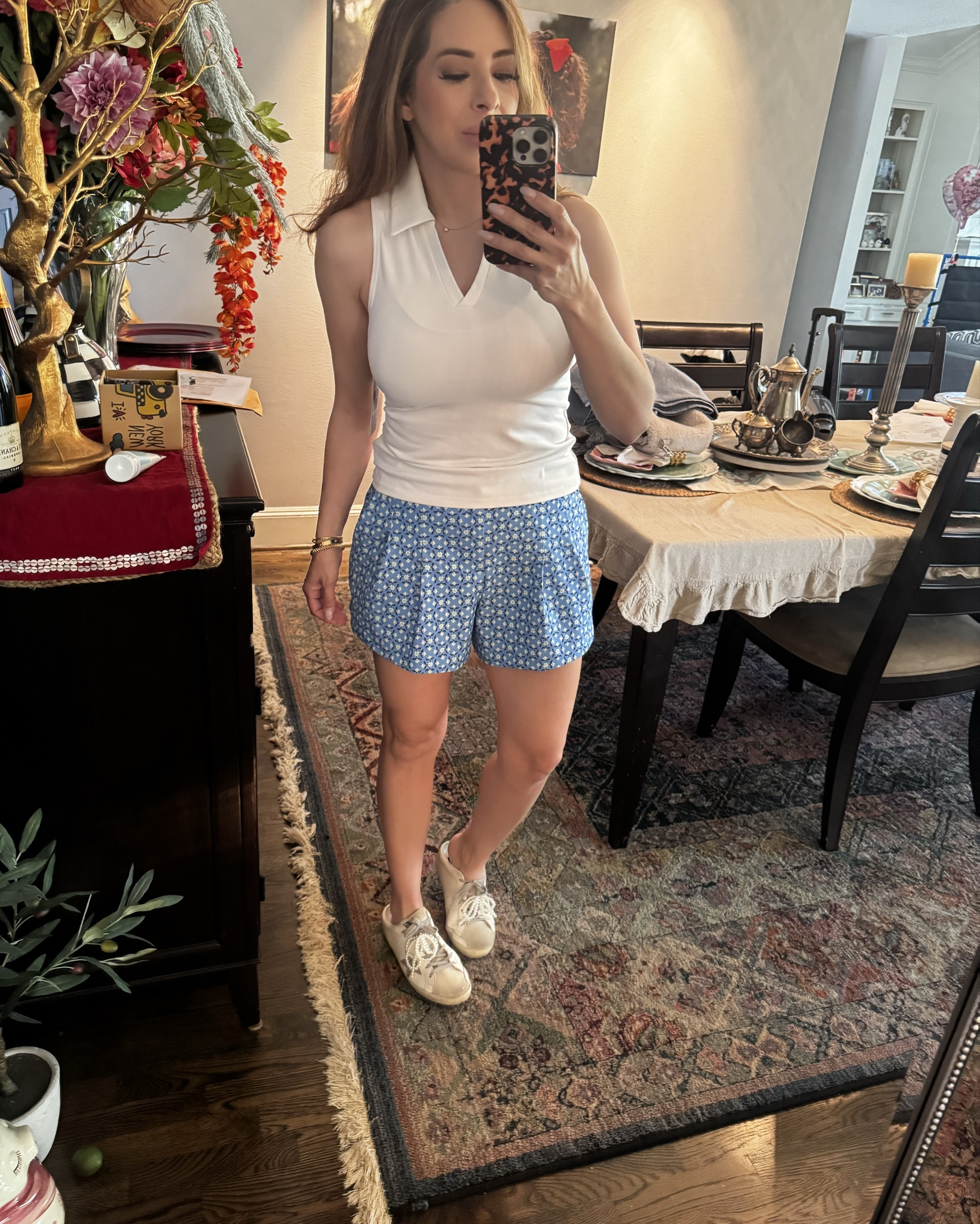 Level up your weekend athletic wear!! 

These golf shorts are a target find. I have linked them. They are a little oversized so I sized down to an extra small.

This polo tank is by the brand BYLT and is not available to link but can be found on their website. I find this top fits true to size so if you would like it to be a little more generous around the midsection, I would size up. This is a small.

These are great pieces to mix a match whether you’re on the golf course or on the softball baseball fields or just running errands on the weekend. 

Shorts are available in this floral print, green, white, and navy. Sizes XS -XXL. $30

The tank is available in white, green and black. Sizes extra small through extra large. it is called the bomb.. $48