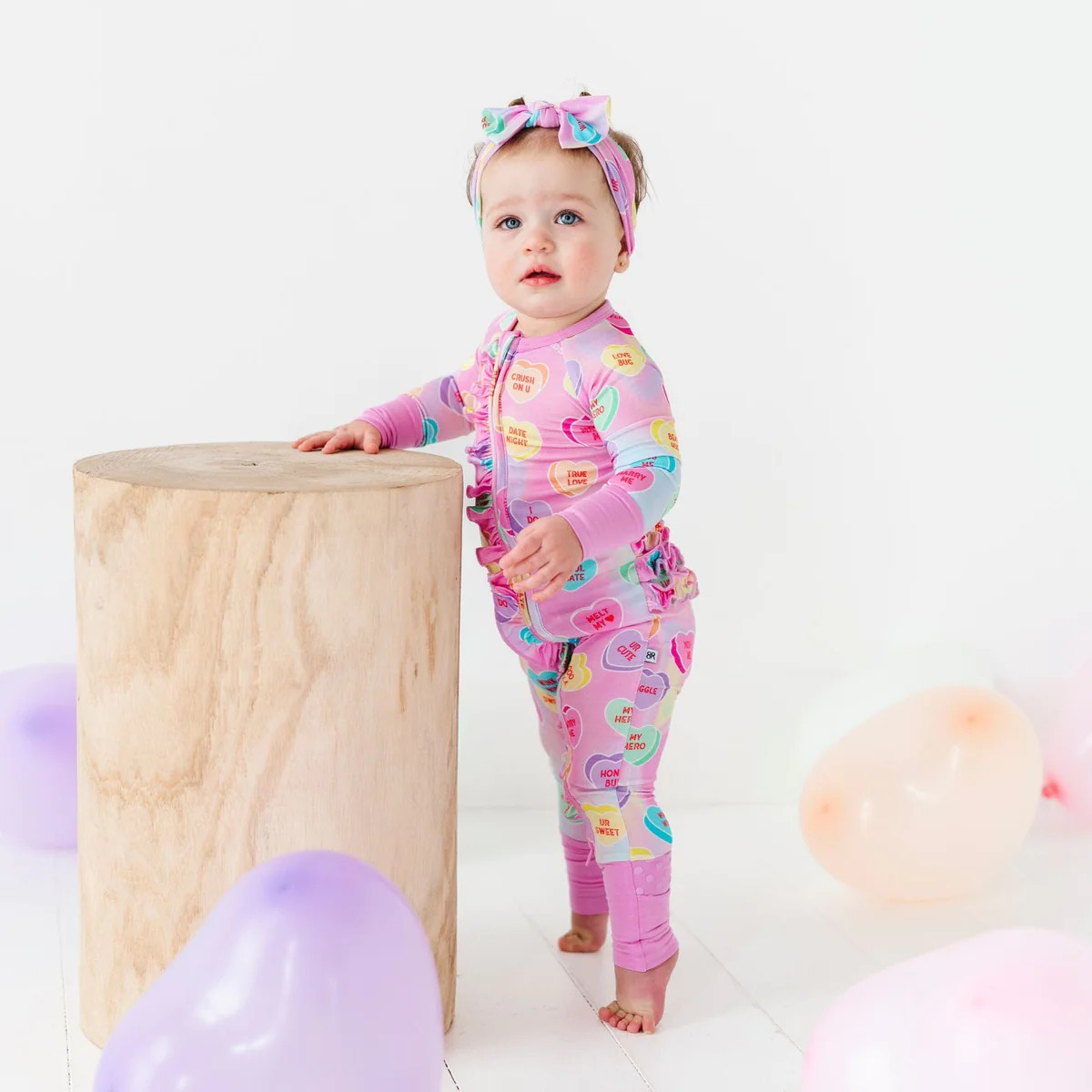 Sweethearts® Pink Pastel Hearts Convertible Ruffle Romper | Bums & Roses