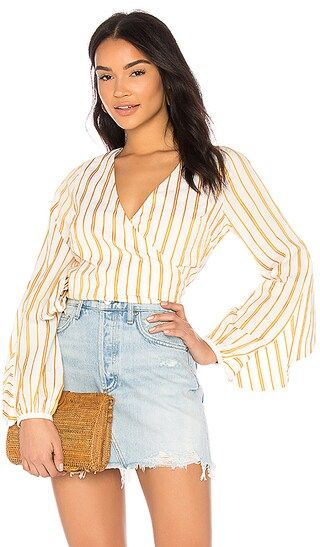 THE JETSET DIARIES Tita Wrap Top in Golden Stripe | Revolve Clothing (Global)