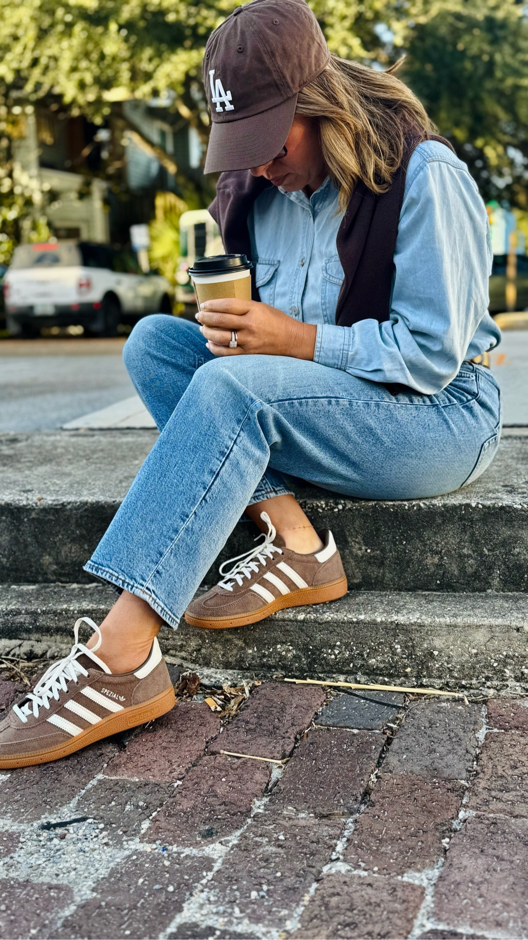 Nothing beats a good denim shirt and comfy sneakers for a crisp morning stroll. Casual fall layers 🍂
👖 Denim on denim
👟 Brown Adidas Sambas
🧢 LA cap
☕️ Weekend coffee run fit

#LTKgrwm #LTKStyleTip #LTKootd