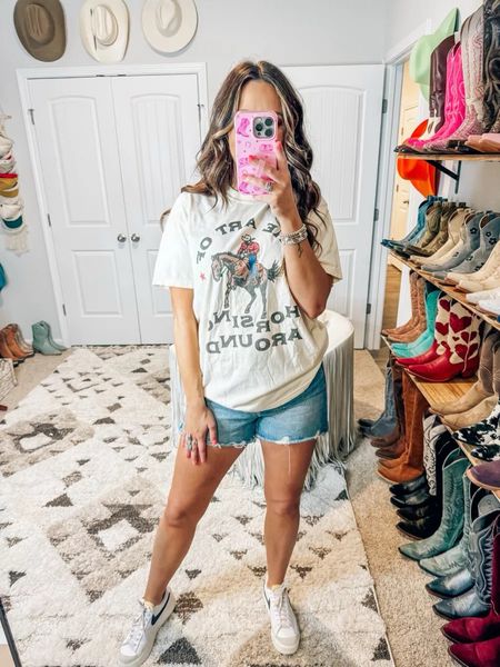 Western graphic tee shirt styled with denim shorts and white nike sneakers. A causal summer outfit and an idea for how to style a graphic tee!
6/12

#LTKSeasonal #LTKStyleTip #LTKFindsUnder100