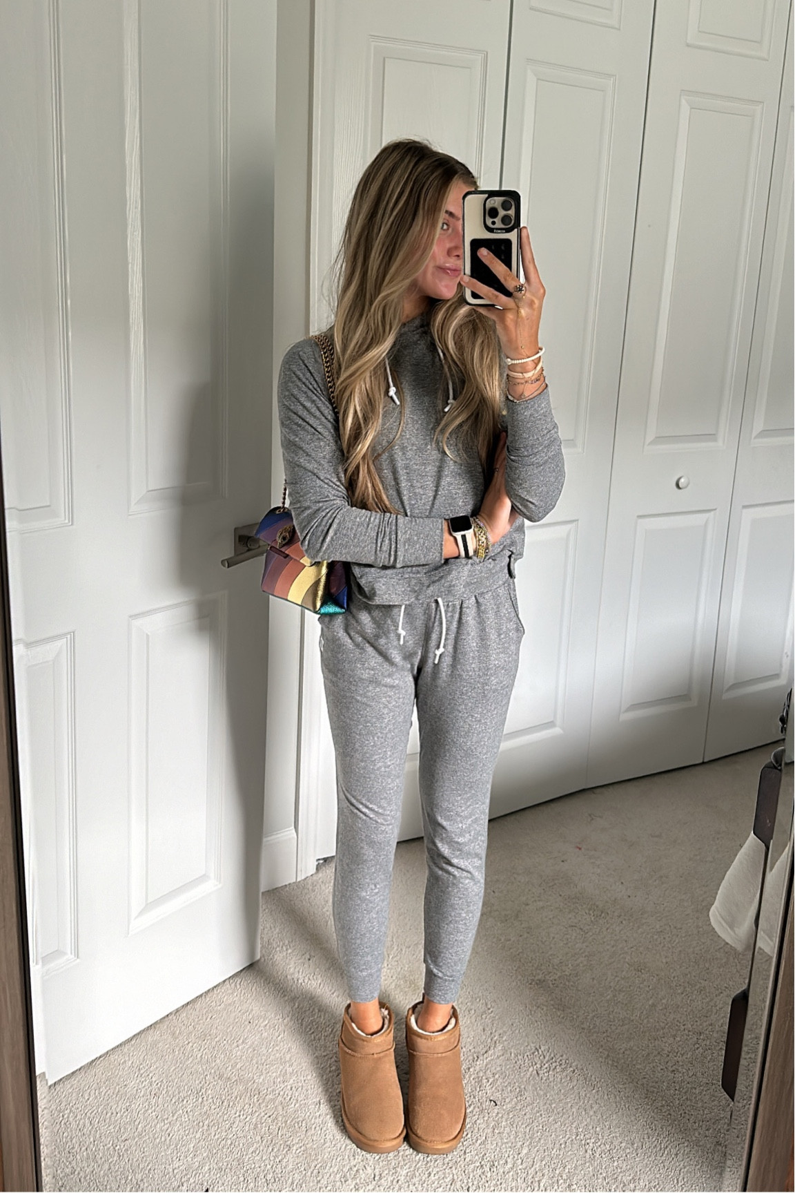Rhoback jogger and hoodie set. Sweatshirt. Hoodie. Sweatpants. Joggers. Loungewear. Athleisure. Kurt Geiger purse. Crossbody. Uggs. Amazon fashion. Boots. Accessories. Jewelry. Sleepy tie hair. Outfit. OOTD. Outfit of the day. 

#LTKU #LTKstyletip #LTKfindsunder100