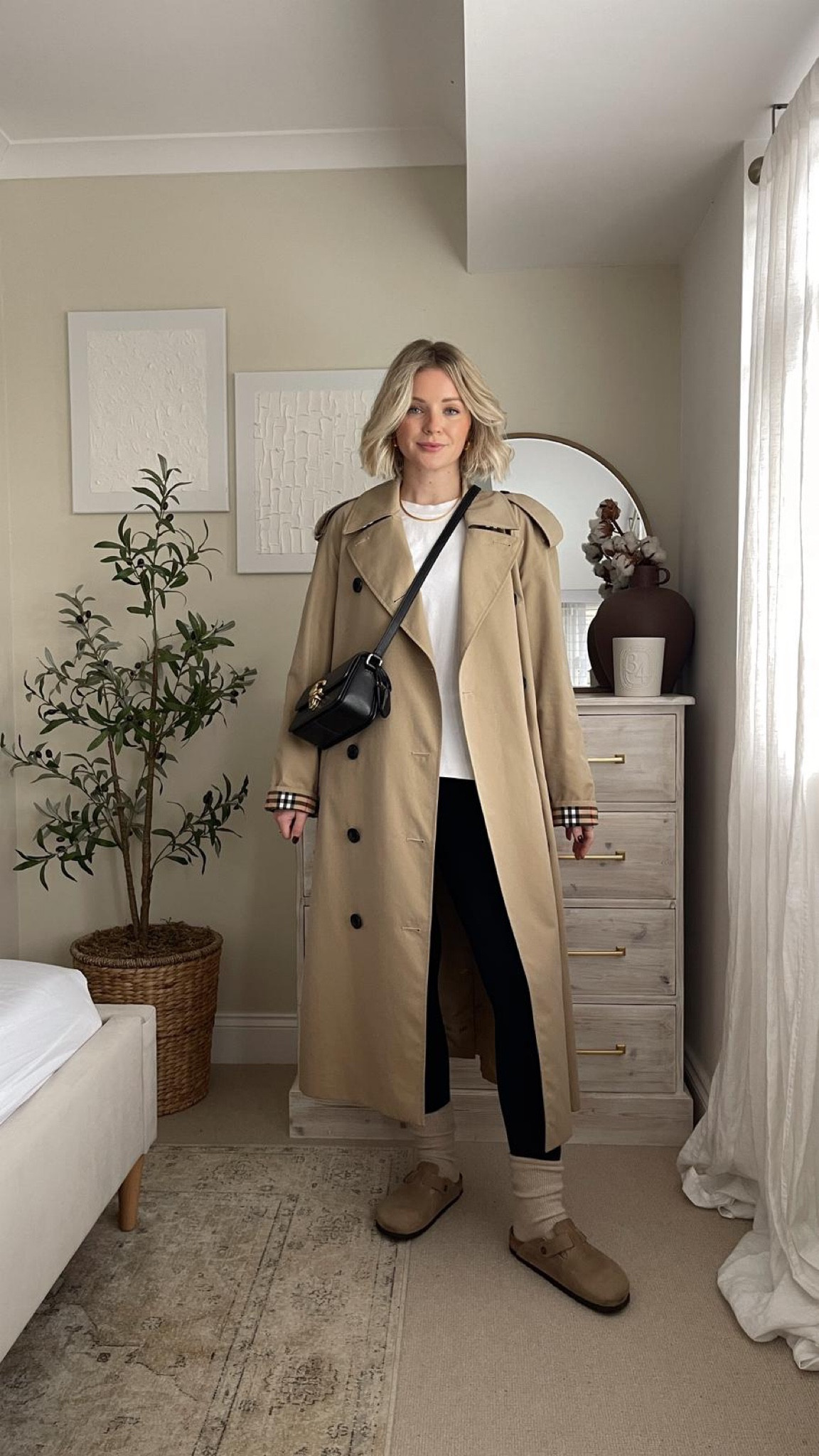 Ways to wear black sweaty Betty all day leggings & arket white heavyweight t-shirt - Burberry trench coat, white company cream cashmere socks, black coach studio crossbody bag, Birkenstock Bostons  

#LTKeurope #LTKSeasonal #LTKstyletip