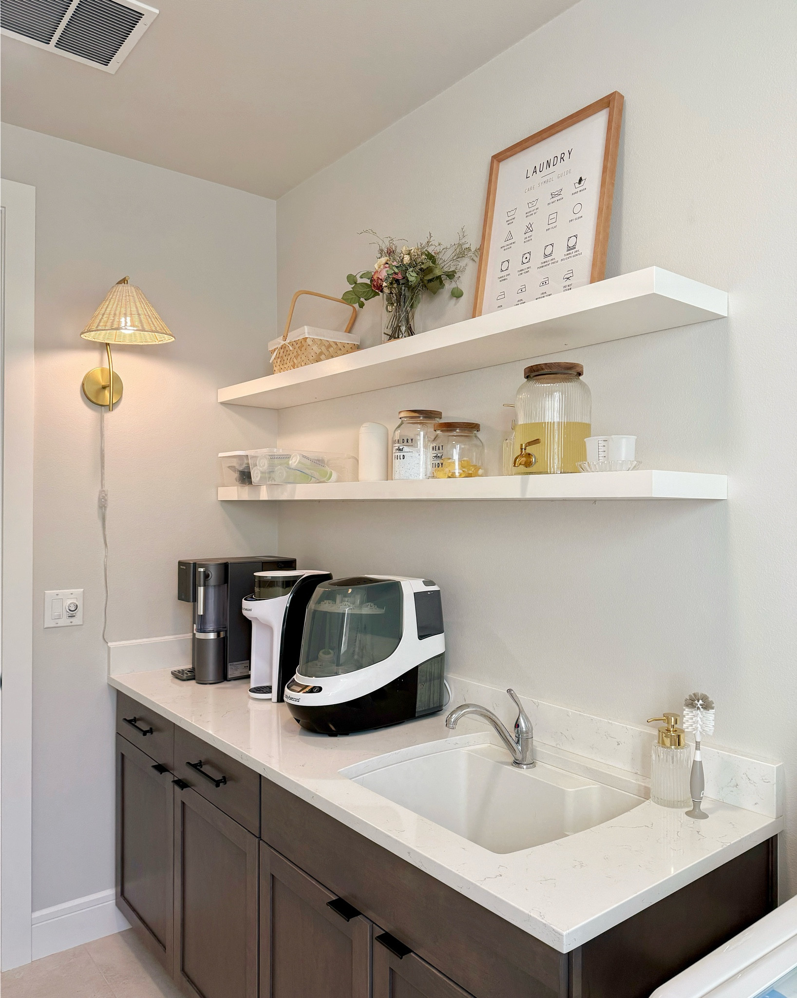 One room, three jobs: laundry station, baby feeding hub, tea break corner ☕🍼🧺
Added IKEA floating shelves and smart tools like a bottle washer, RO system, and formula dispenser to make it all work (and look) better.
Shop the details on LTK! #MomHack #FormulaReady #LTKHome #BabyEssentials #SmartSpaces #ModernLaundryRoom #MultifunctionalDesign

#LTKHome #LTKBaby