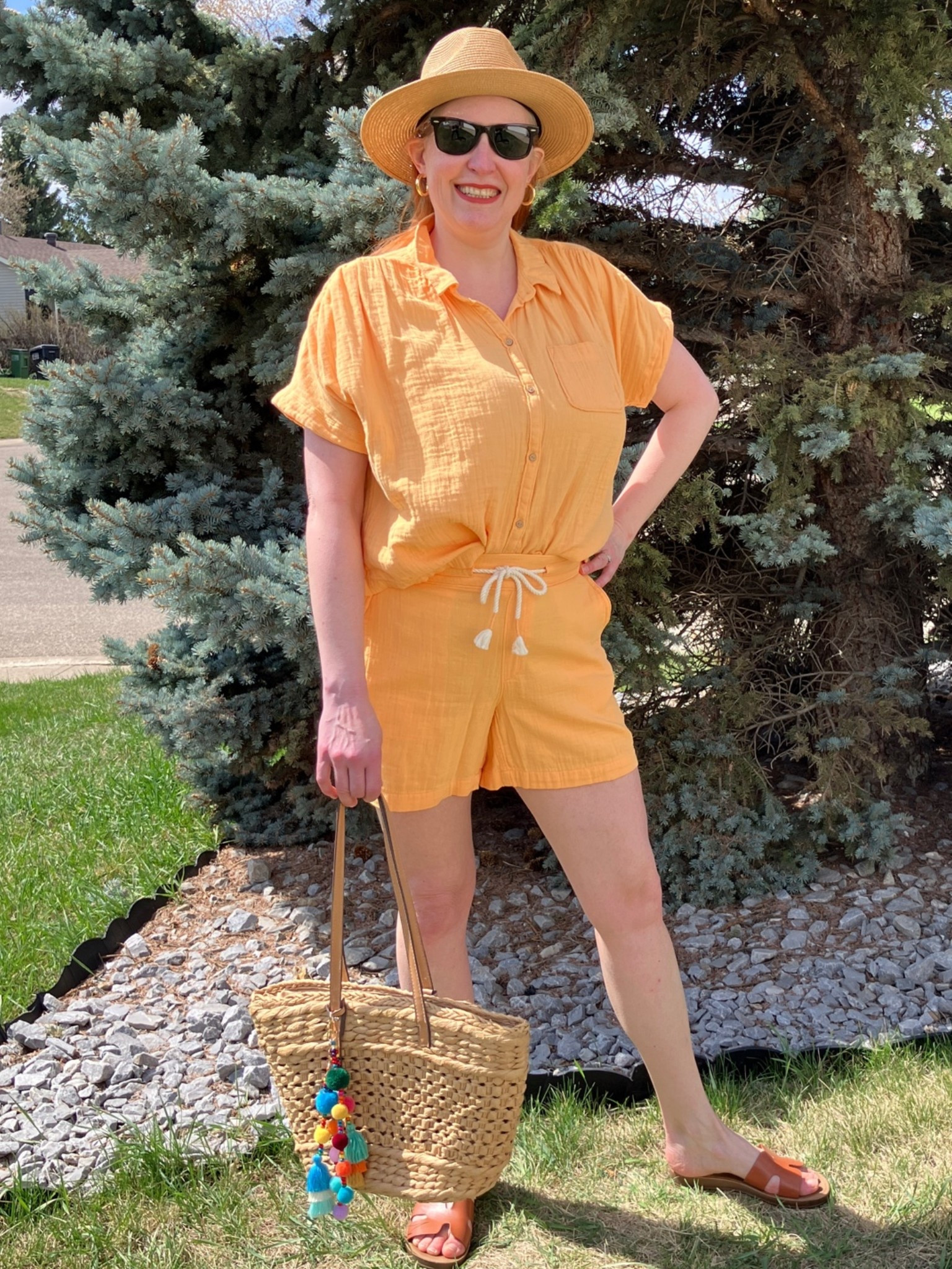 It’s easy to walk this way when a matching set is involved! The two pieces were sold separately so I could get my medium top and small bottoms. Such a bright, happy colour too! Makes me long for those hot summer days. I just kept my hat, sunglasses, sandals, and bag  simple except for my colourful bag charm. Canadians click on the first links to shop, and Americans click on the second links to shop. If there’s only one link then you can shop it in your own country. And remember, trendy doesn’t have to be expensive! Bye!

#LTKcanada #LTKtravel #LTKover50style