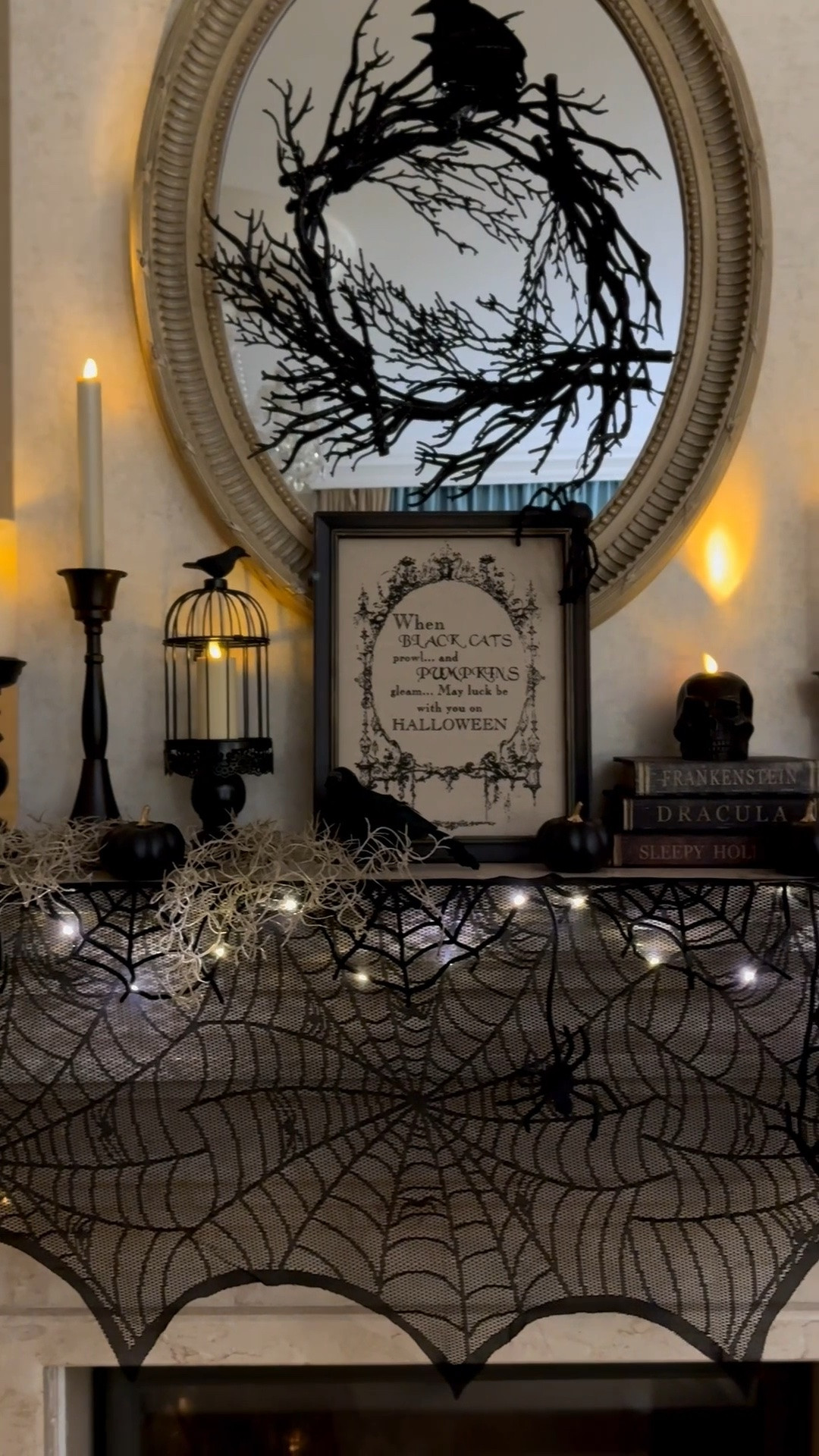 Halloween home decor, Halloween living room mantel, black skull candle, decorative crows