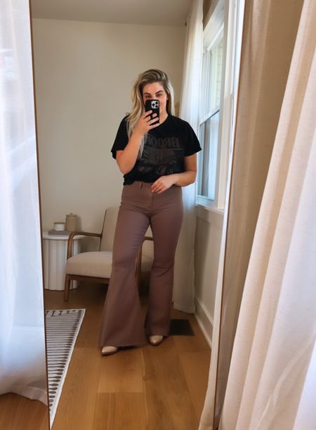 On sale! The code is FALLFITS25. These brown bell bottoms are so fun! Love them styled with a band tee but they could also be dressed up with a pretty blouse or blazer. 
.
.
#bohme, bell bottoms, band tee, casual tee, country concert, nashville outfit, casual fall outfit 

#LTKunder50 #LTKsalealert #LTKcurves