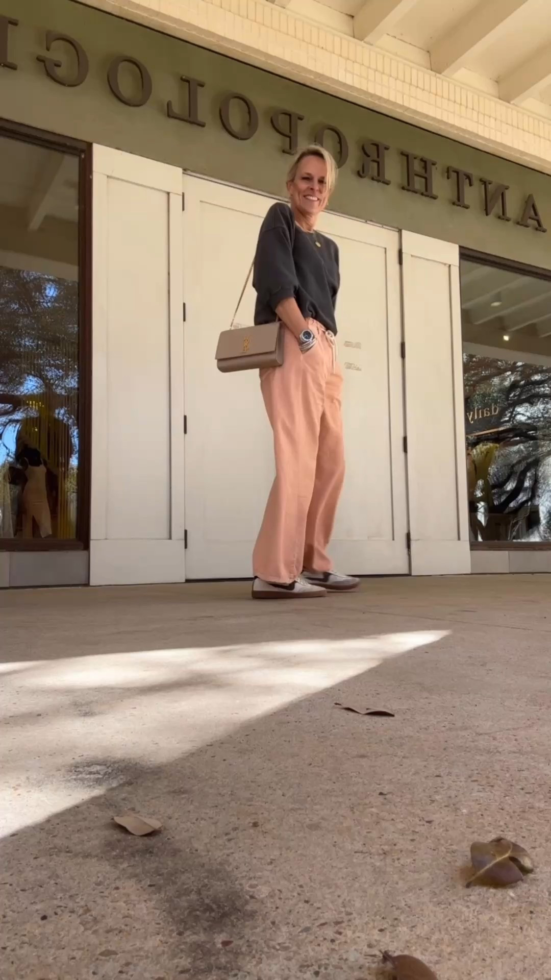 When you are walking intoAnthropologie, completely dressed in Anthropologie!! lol 

This short sleeve sweatshirt is so good. I own it in three colors. Everyone is loving the sleeve length.
I sized up one size to a medium. 

Wide leg pants fit true to size 

#LTKStyleTip #LTKOver40 #LTKFamily