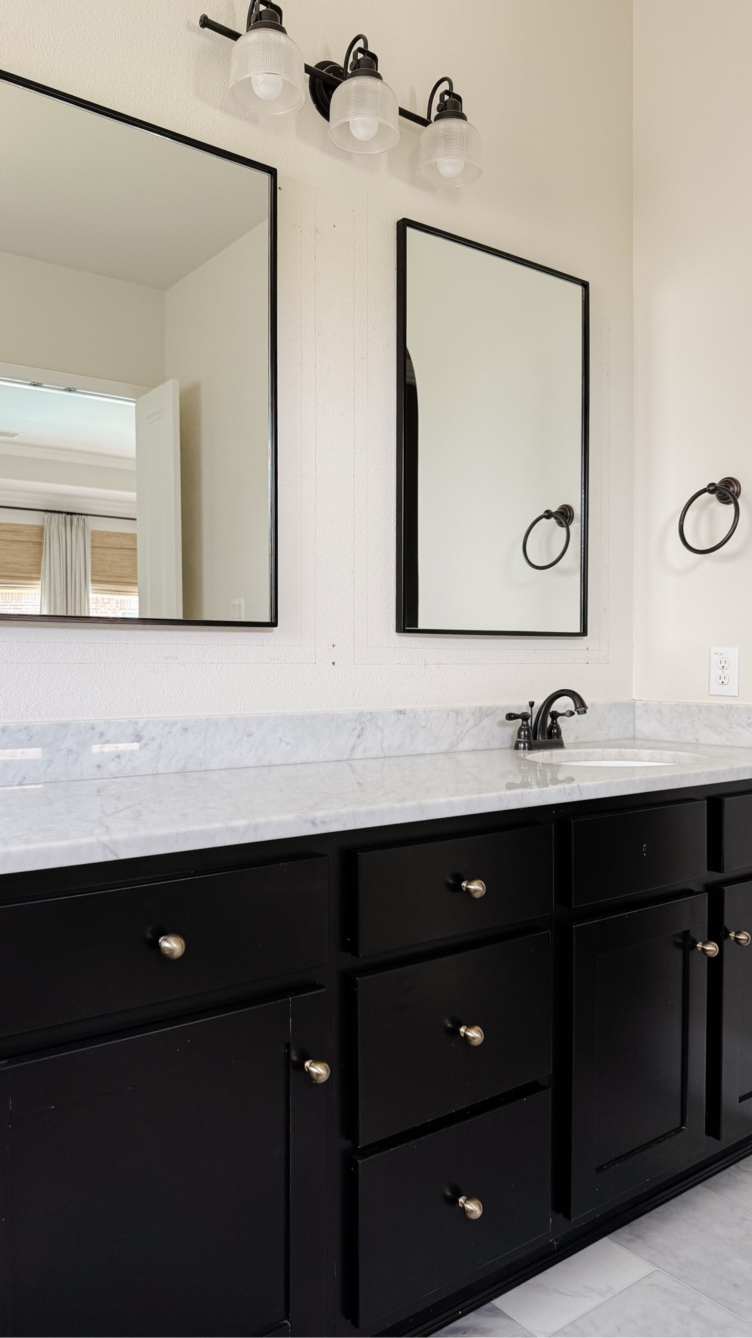 Simple black framed bathroom mirrors. These come in a bunch of sizes and multiple finishes!

#LTKHome