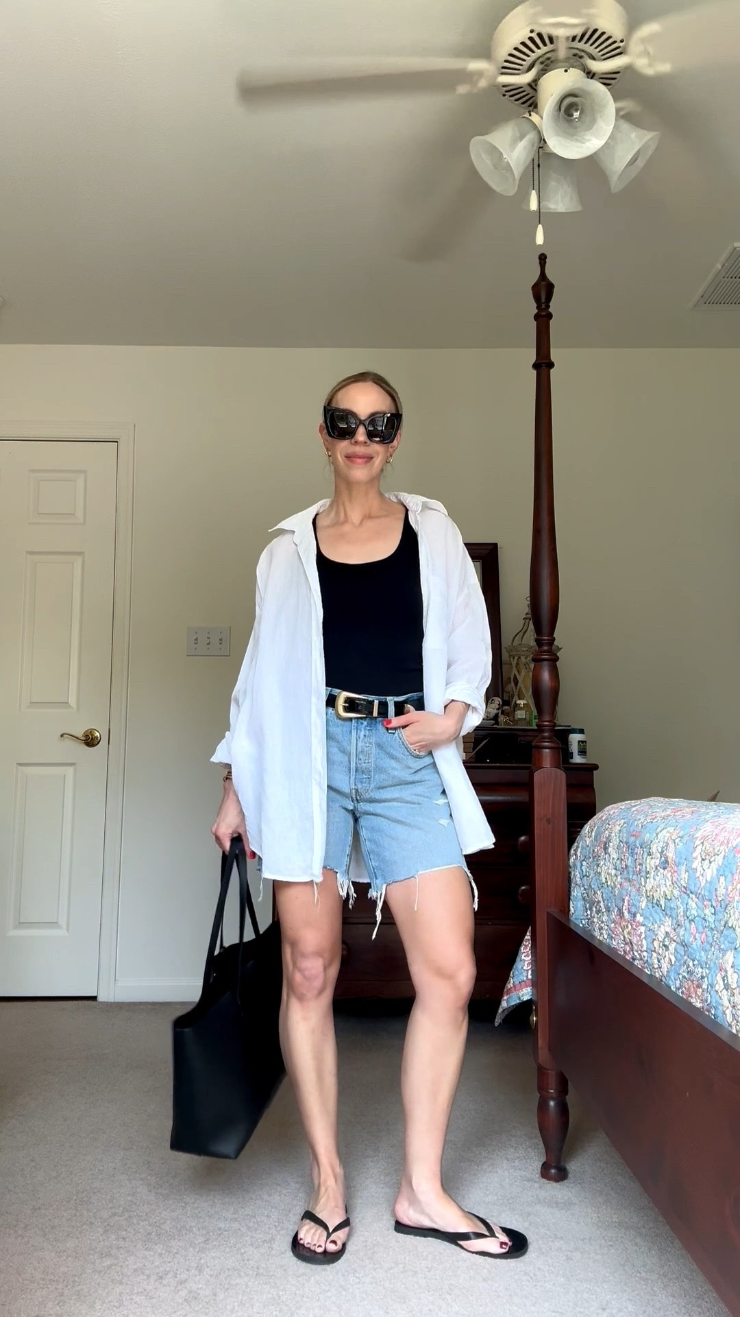 Casual summer outfit over 40 with oversized linen shirt, denim cutoff shorts, leather thong sandals

#LTKOver40 #LTKSeasonal #LTKSaleAlert