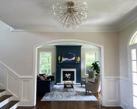 Another eye-catching moment from The Colorful Colonial’s foyer - featuring one of our all time favorite surface mount light fixtures! She sure is a beauty and makes such a statement!