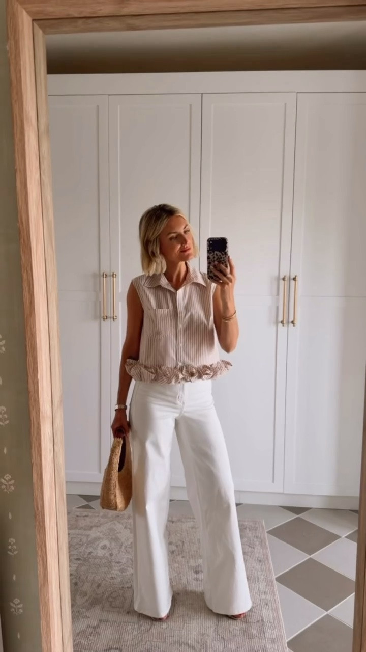 Can’t get over this ruffle top from Anthropologie! How unique and fun is the ruffle and button down detail? This is such a fun top for work and even could be paired with white denim shorts for weekend wear! Get 20% off your order at Anthropologie with code LOVERLY20 at checkout! Wearing XS top and 4 in jeans!

Loverly grey, work outfit ideas spring summer, how to style white wide leg jeans, raffia bag, Anthropologie sale, Target style fashionfinds

#LTKSeasonal #LTKSaleAlert #LTKootd