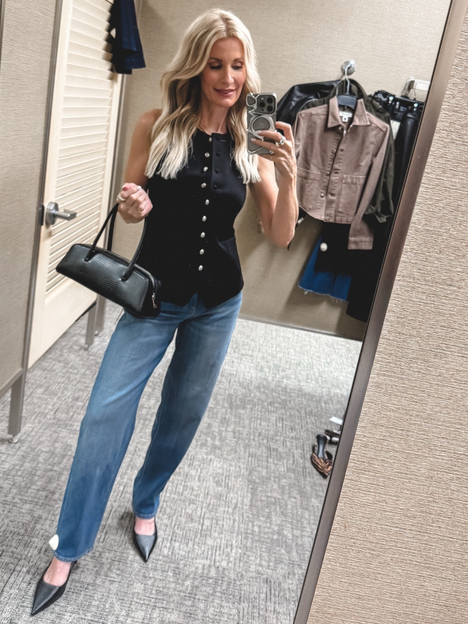 Entire look is part of the Nordstrom Anniversary Sale. ✨ This Rag & Bone sleeveless black vest has an impeccable fit, and I love the silver buttons. I paired it with my #1 denim pick from the sale—these Veronica Beard Soft Barrel jeans that are so flattering—and these chic black lizard slingbacks. I’m wearing an XS in the vest and a 24 in the jeans.

#LTKootd #LTKOver40 #LTKSaleAlert