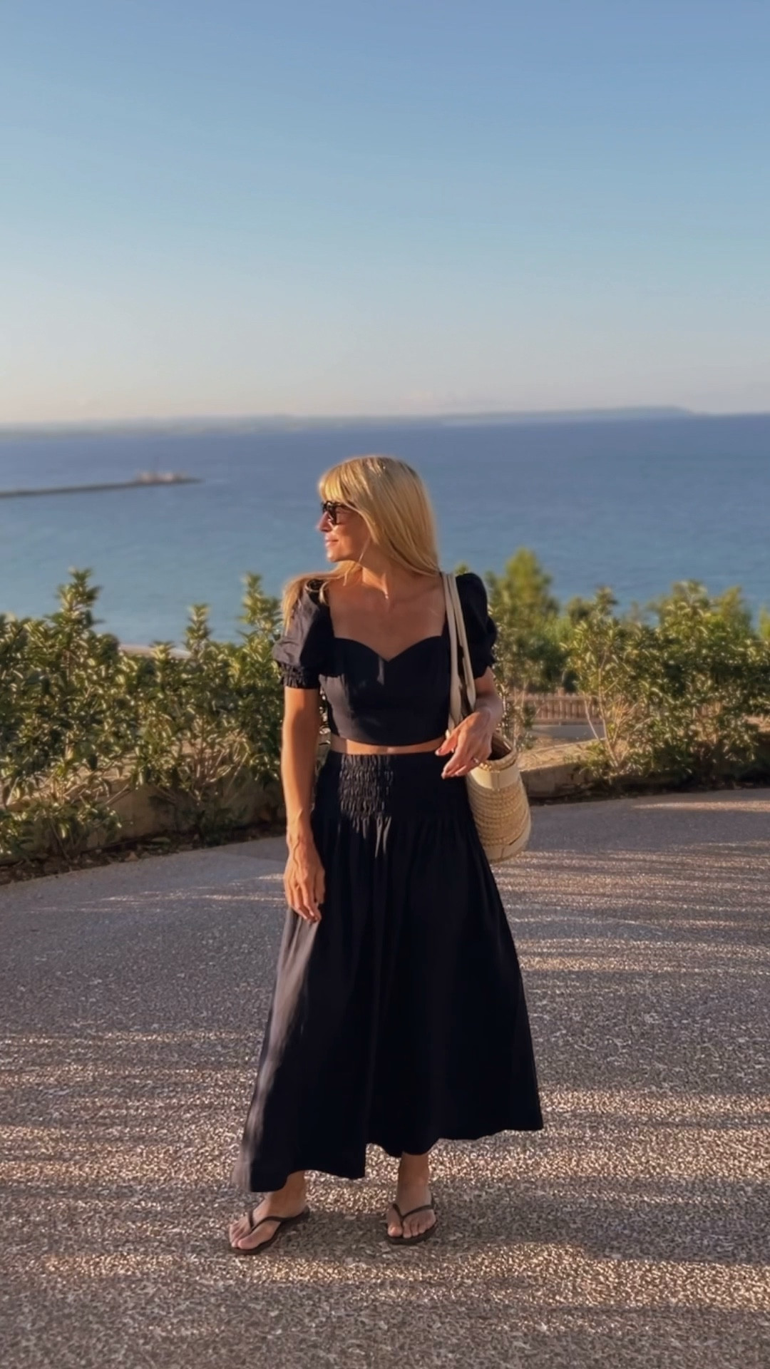 Sweetheart linen cropped top, maxi skirt, wicker tote bag, black flip flops 

#LTKSeasonal #LTKeurope #LTKtravel