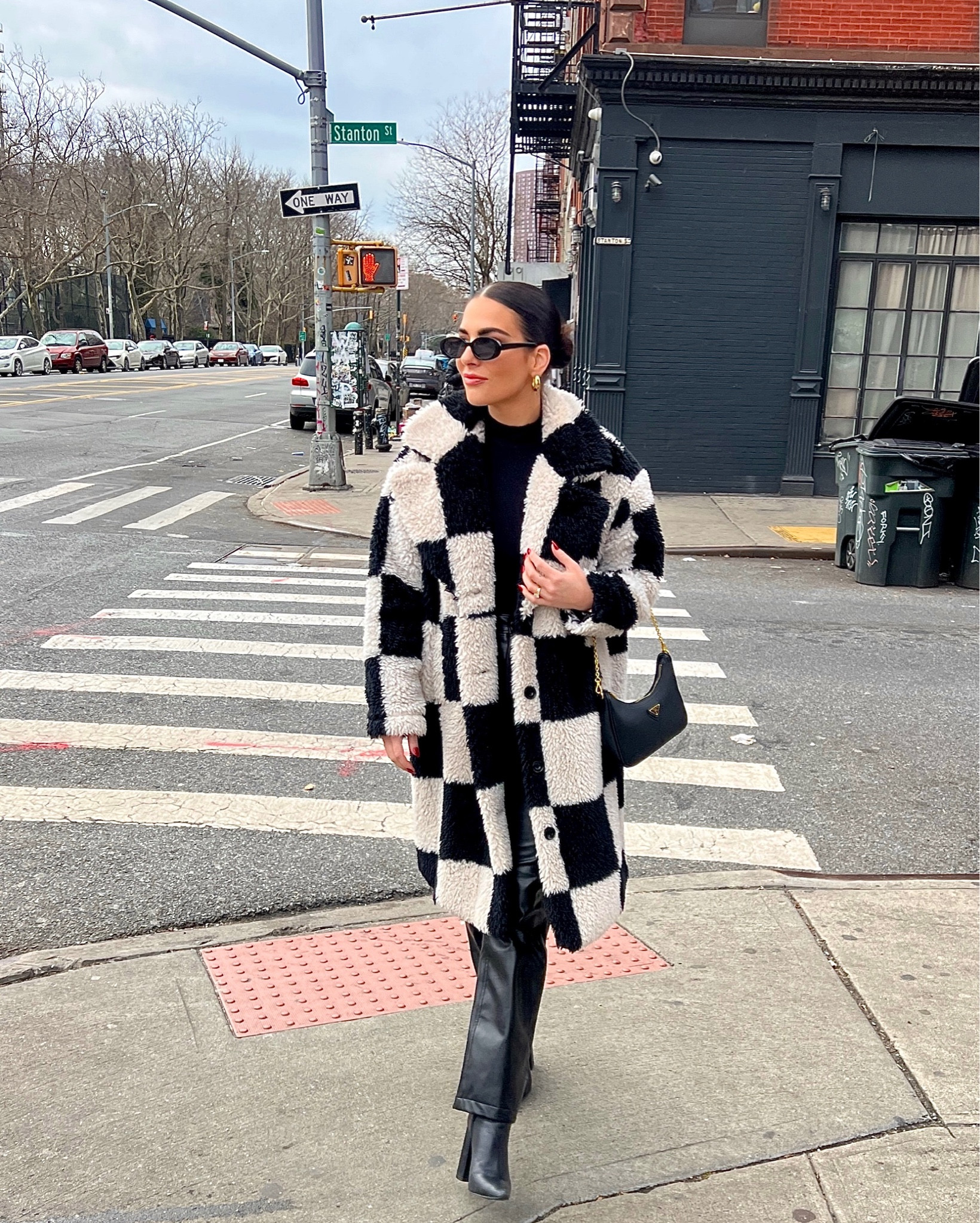 Trendy checkered coat that I wore in NYC! Super cozy and warm. Love these black leather pants, I wear them all the time! So comfortable and go with anything! 

#LTKfit #LTKFind #LTKstyletip