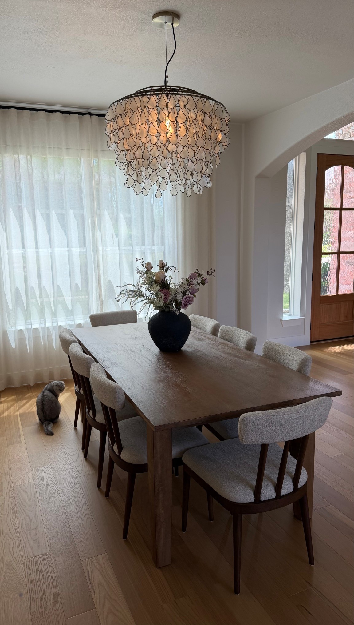 Dining room 🫶 the first thing I bought for our new home was this chandelier, and it’s still my favorite piece ⚡️✨