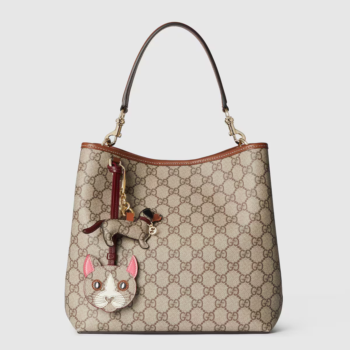 GG Emblem small shoulder bag | Gucci (US)