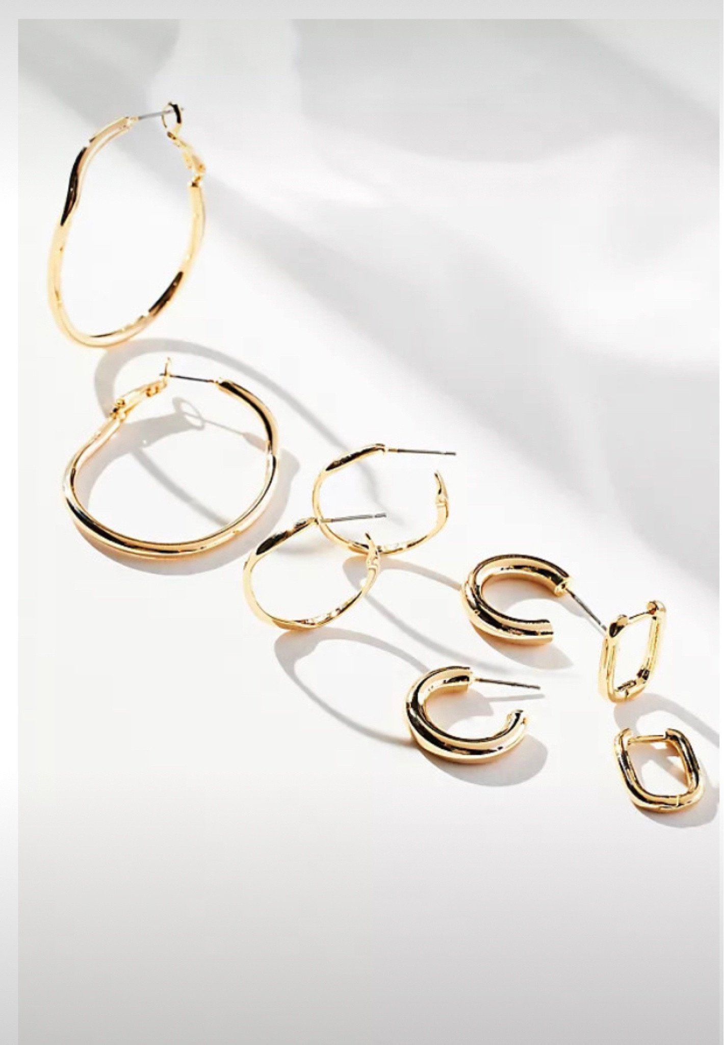 one of my top comments is asking where my earrings are from. this set is from anthropologie, and i always have the square and smaller hoops in! 

#LTKGiftGuide