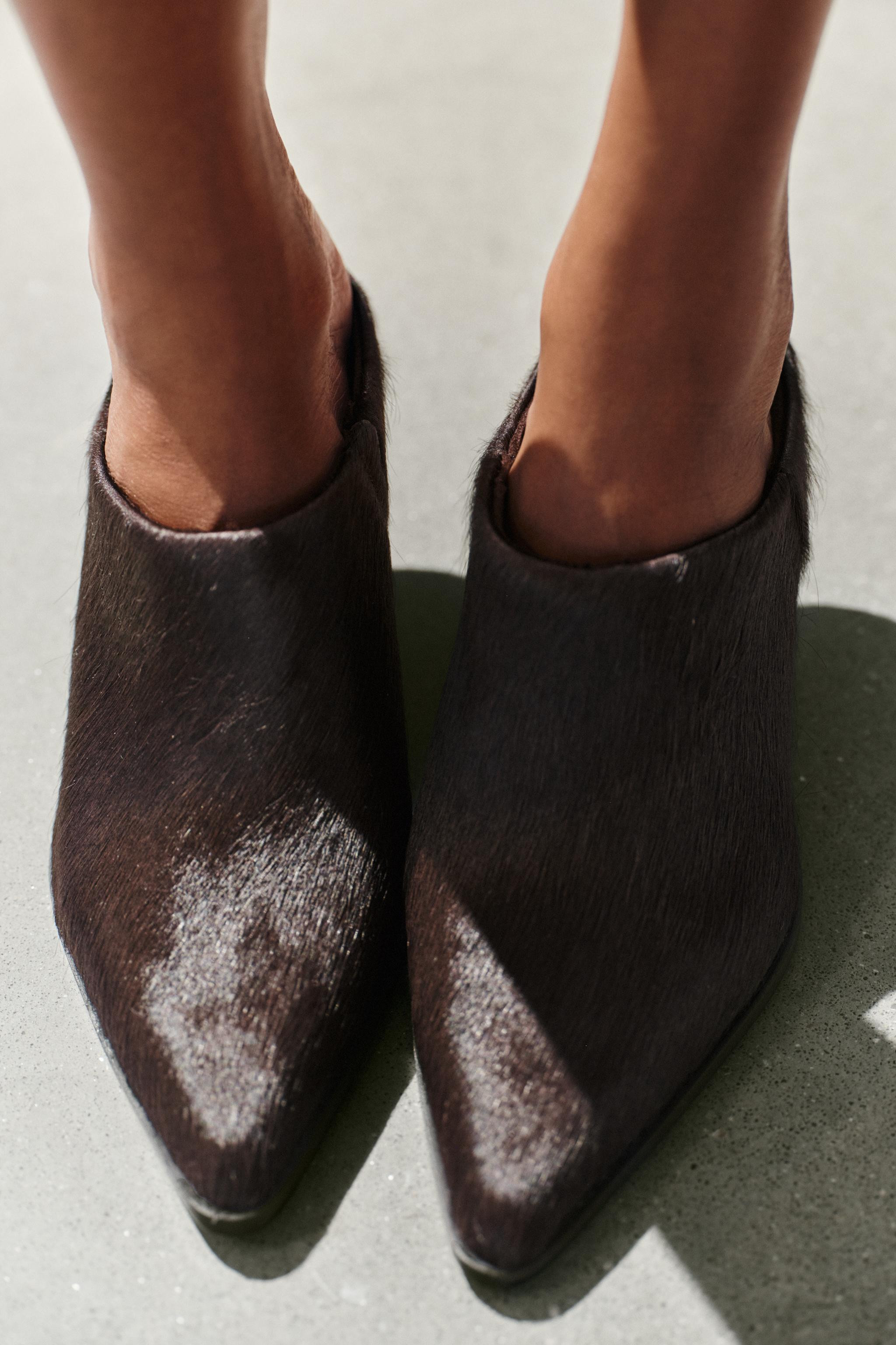 Leather mule heels with fur detail. Round neckline. High block heel. Pointed toe.Heel height: 3.3... | Zara US