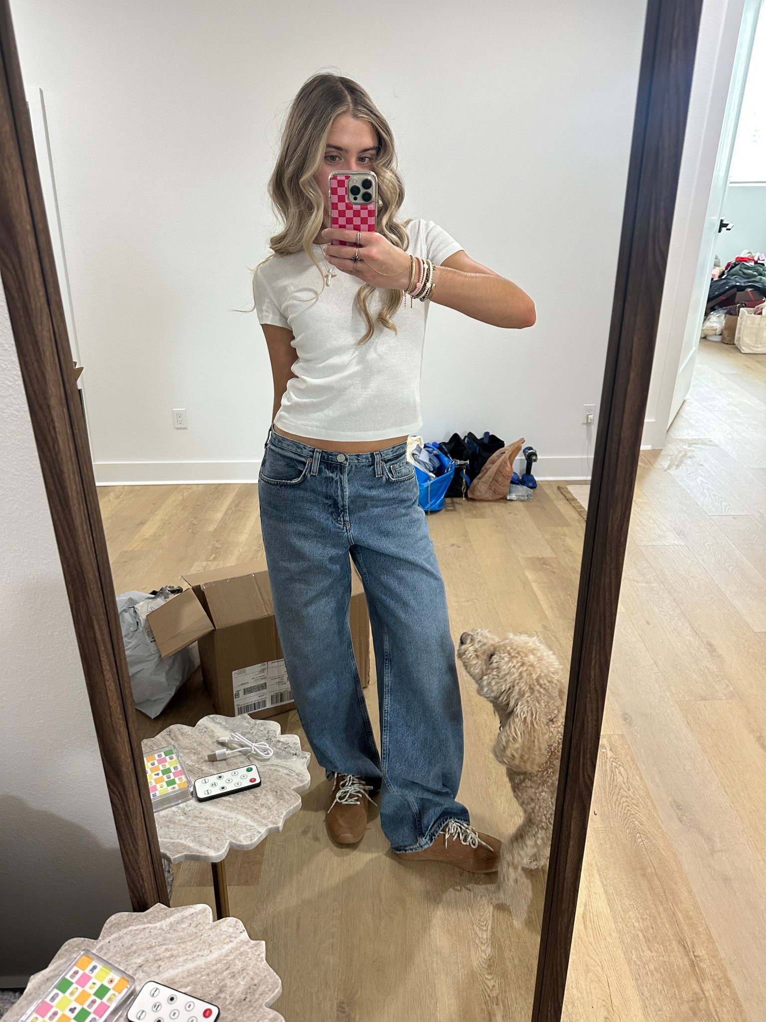 Airport travel outfit heading to LTKCON! My jeans I just got from aritzia they are Agolde Kiera Jeans size 23 so size down at least one I sized down two whole sizes. My baby tee is Cocolilly but I also have the Cuts one linked which is my favorite. My sneakers are new WALMART finds they are Miu miu look for less  



#LTKTravel #LTKCon #LTKShoeCrush