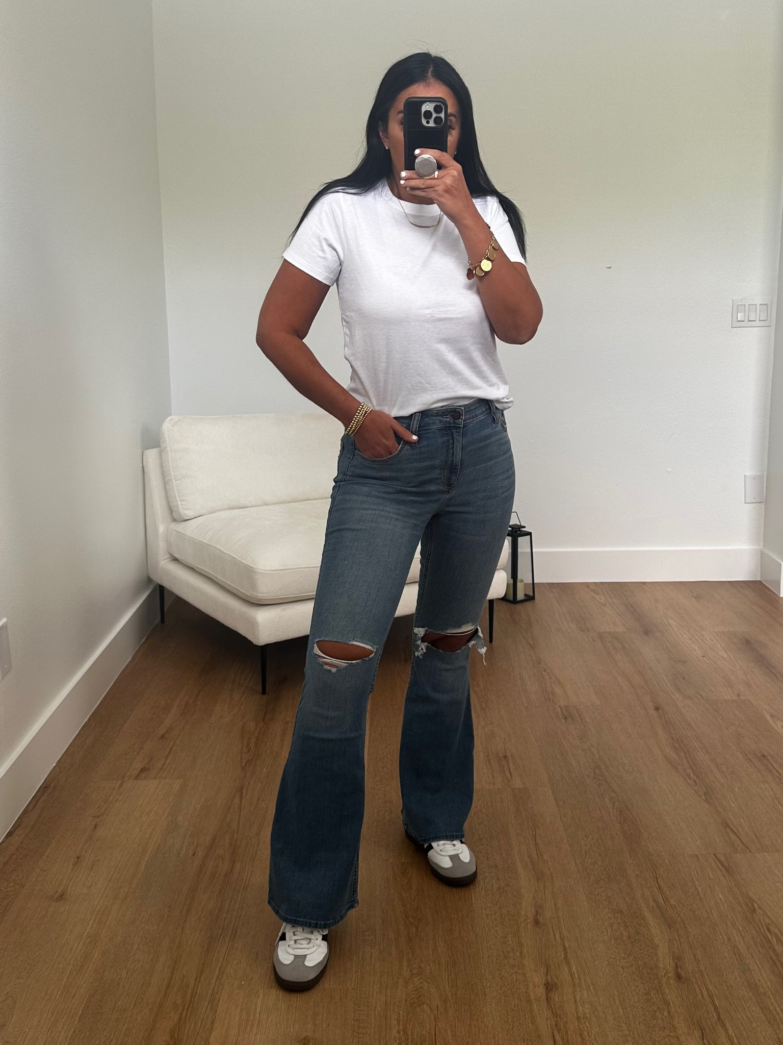 Longer-Length Crew T-Shirt wearing size medium. High-Rise Ripped Medium Wash Flare Jeans wearing size 6. Adidas Sambas
