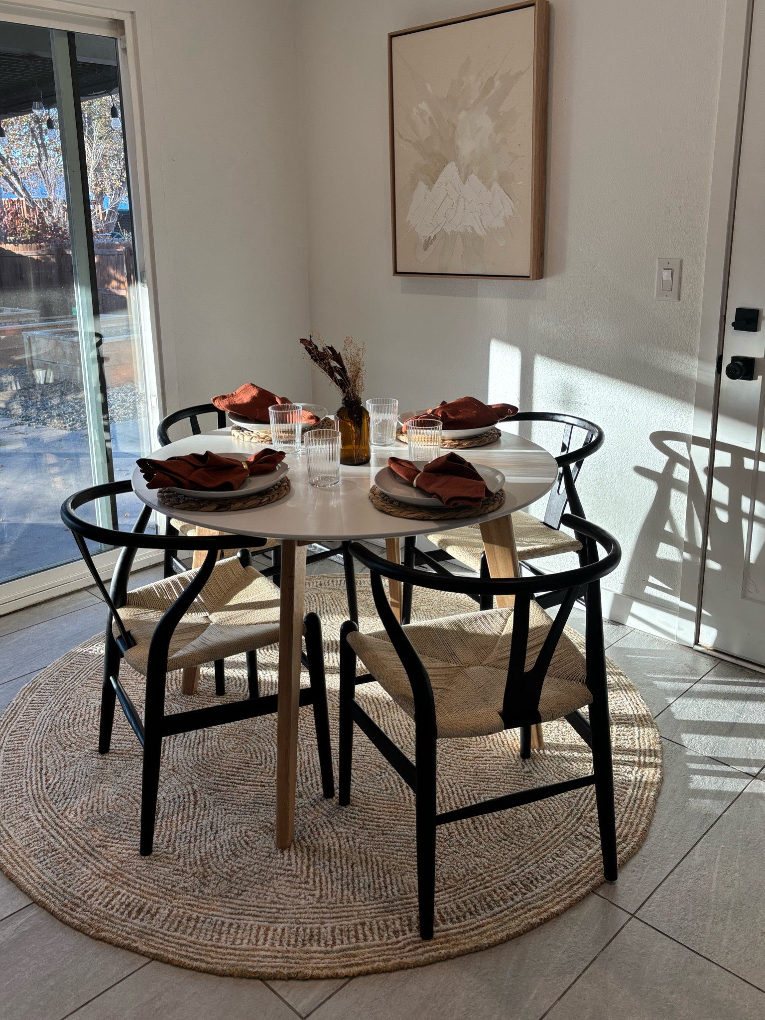 Our kitchen table setup! The table from Wayfair is sold out but the chairs and rug are such a steal. Love how the rug hides everything!

#LTKHome