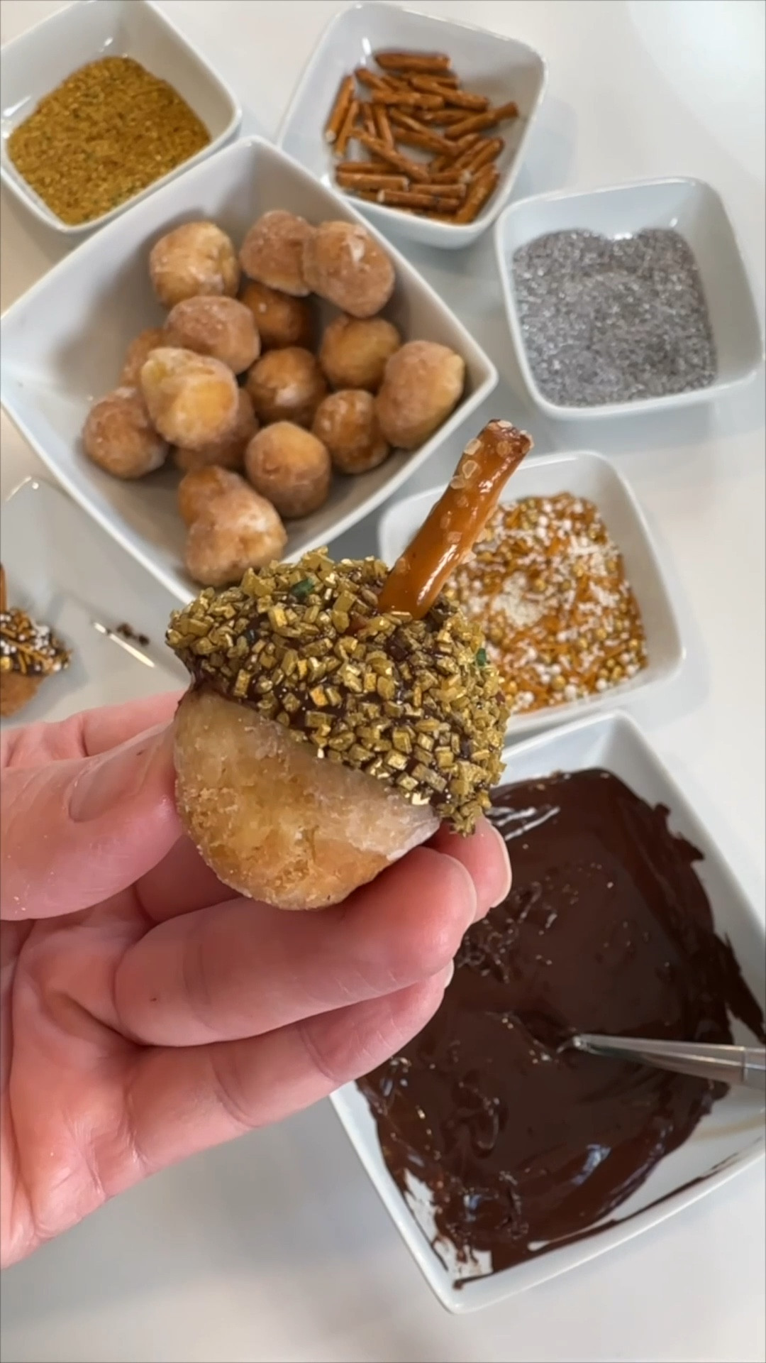 Looking for a quick and adorable Thanksgiving dessert? 🍩🍂 These acorn donut holes are the cutest treat to bring to the table! Simply dip donut holes into melted chocolate, top with sprinkles or crushed nuts, and add a pretzel stick for the stem. Perfect for kids and adults alike! Save this idea for your holiday celebrations! 🦃 #ThanksgivingTreats #EasyDesserts #LTKHoliday #LTKFamily #Thanksgiving 

#LTKCyberWeek #LTKHoliday #LTKFamily