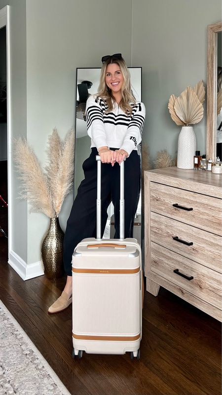 no matter where you go, @paravel has you covered ✈️ // coordinating my travel outfits with my new Aviator Carry-On Plus luggage, which comes in 5 colors and is the world’s 1st carbon-neutral suitcase made of all recycled materials ♻️
