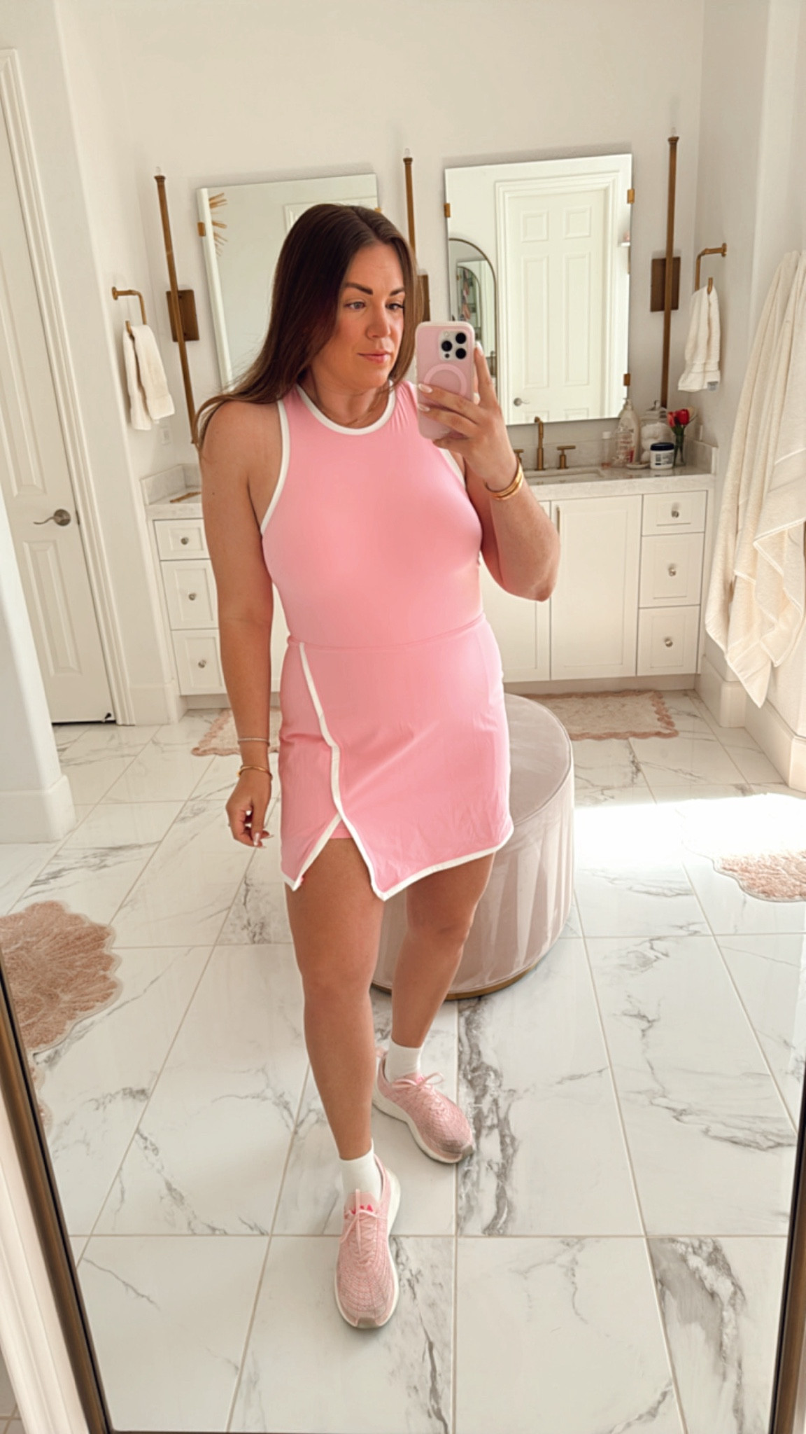 curvy pink athletic dress! has built in shorts + removable bra pads. wearing size large! zips up in the back 👏🏼

#LTKMidsize #LTKActive #LTKFitness