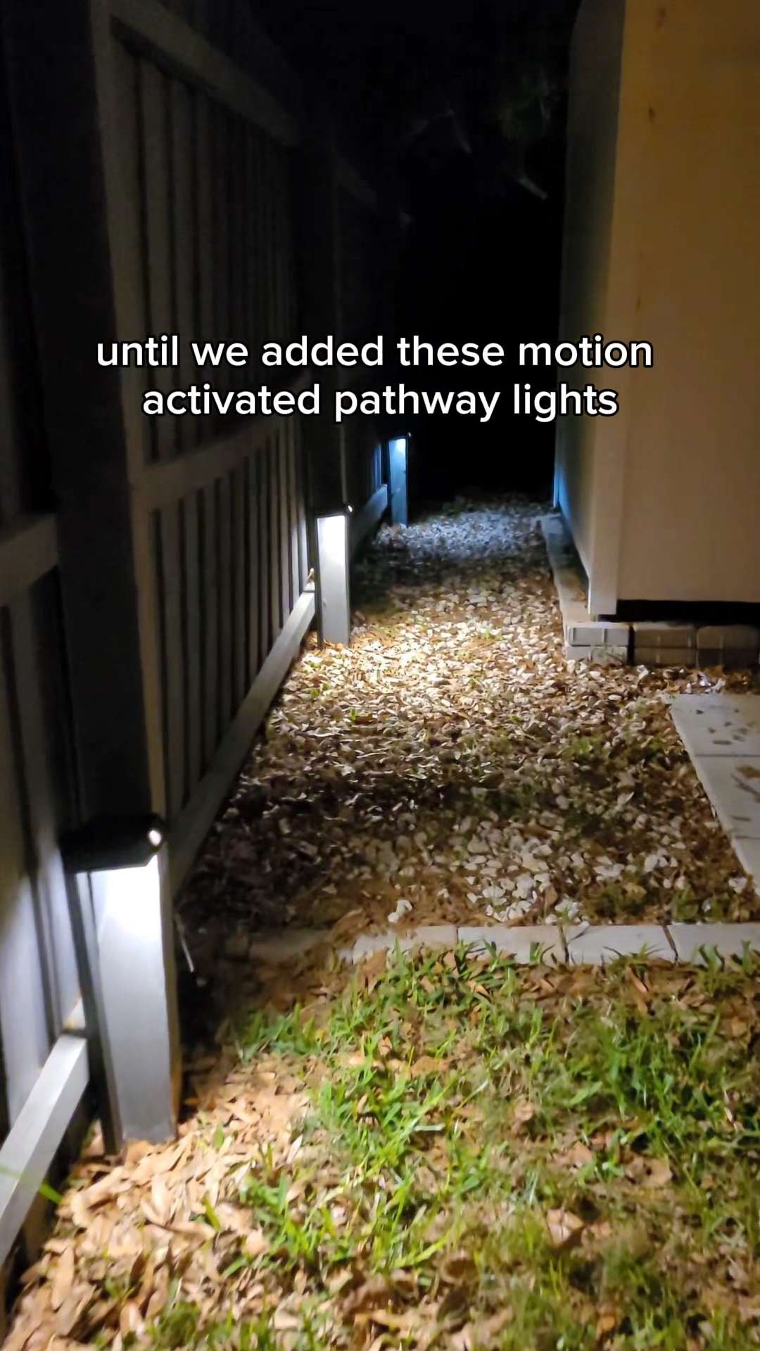 Our side yard used to be so dark at night we could barely see walking back here.

We added these motion-activated pathway lights and it completely changed the space. They turn on automatically, you can adjust the brightness, and switch between warm, medium, or bright lighting depending on the look you want.

Such a simple upgrade that made a huge difference.

I linked the exact lights we use here.

#ltkhome #outdoorlighting #backyardupgrade #amazonhomefinds #homeimprovement #simpleupgrades #ltkfinds #outdoorliving 

 #LTKHome