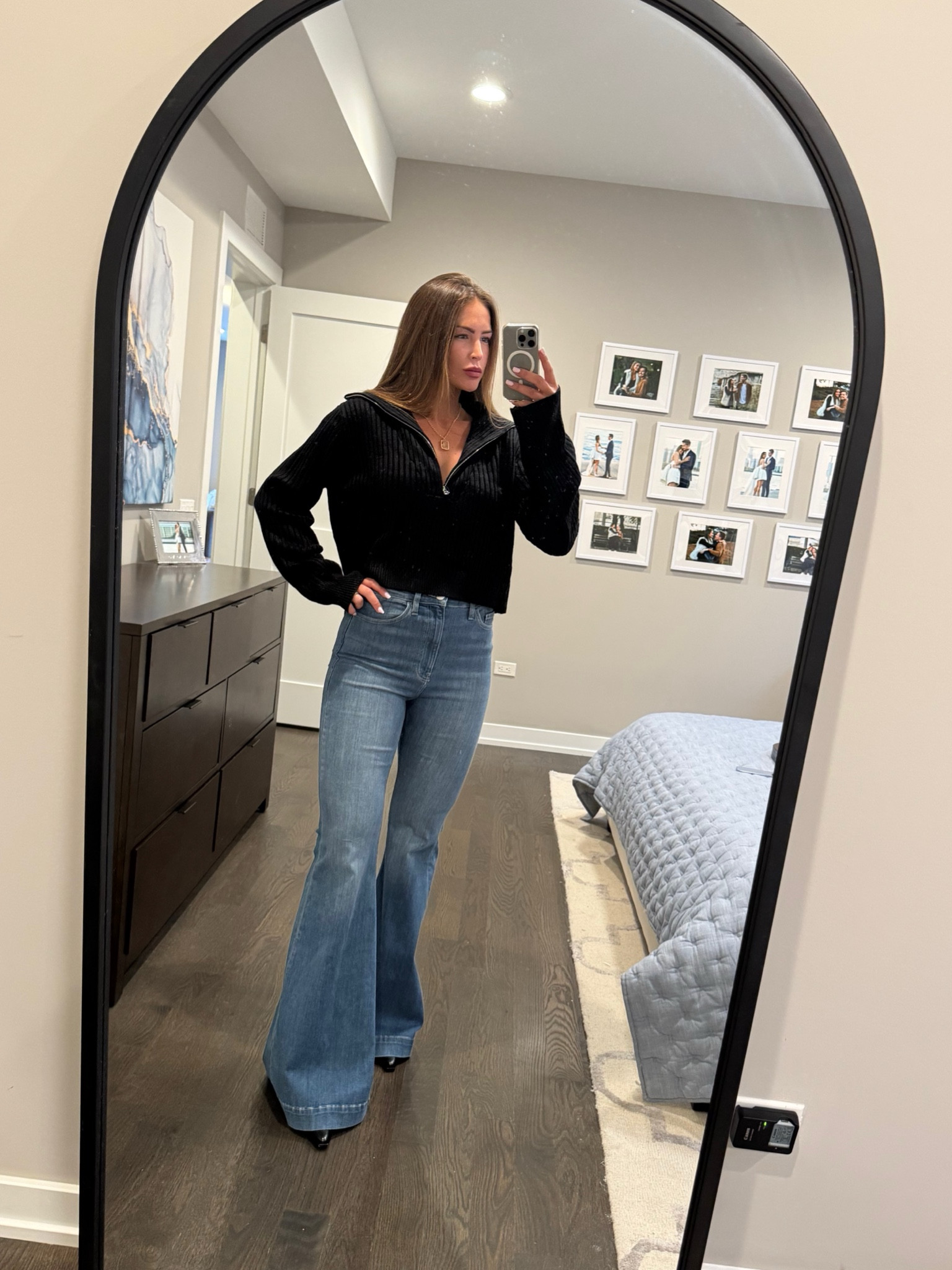 Nothing better than a comfortable pair of jeans. I have been so into the flare. So easy and comfy. I have and always will be a high-rise girl. Obsessed with this sweater. I actually got the cream color first (which has a gold zipper) and had to get the black. The zipper really lets you wear this sweater different ways - which I love. I am wearing a medium in the sweater and 27 in the jeans (true to size) - I ordered a 28 originally and returned for a 27 because the waist had a bit of room. 

#LTKSeasonal #LTKHoliday #LTKCyberWeek