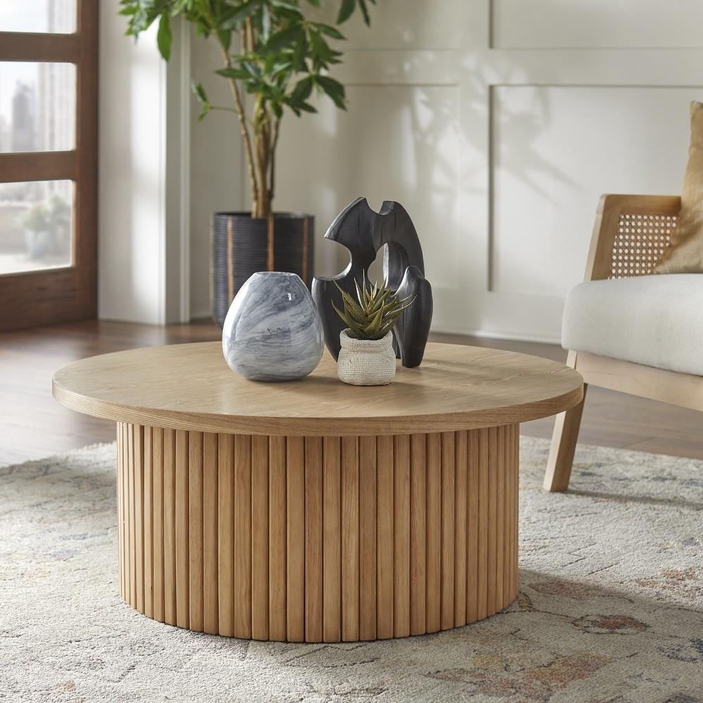 Fluted natural wood coffee table

We love this stylish coffee table. The natural wood color is beautiful  

#LTKMidsize #LTKHome #LTKFamily