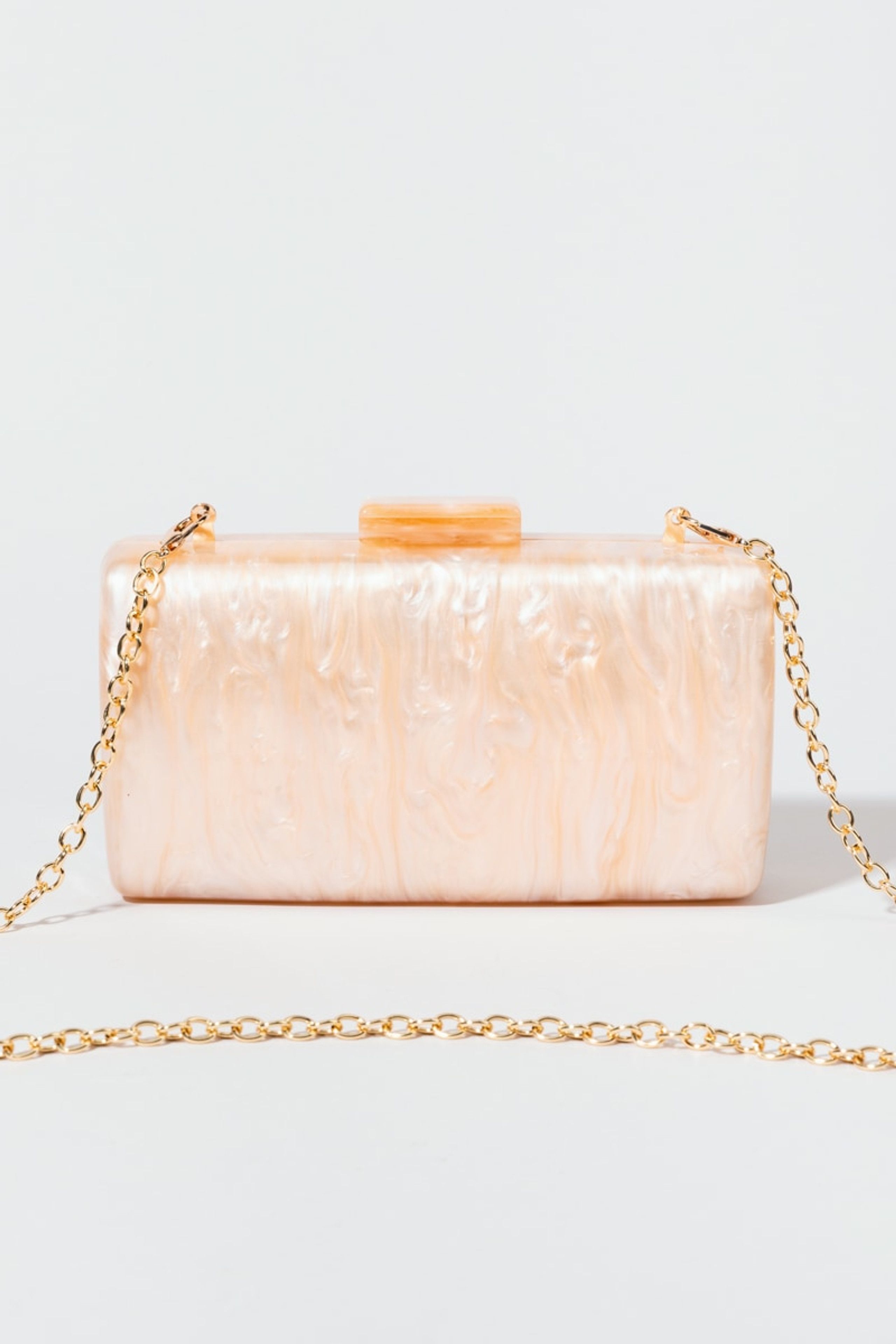 Elsa Acrylic Swirl Rounded Box Clutch Bag | Francesca's