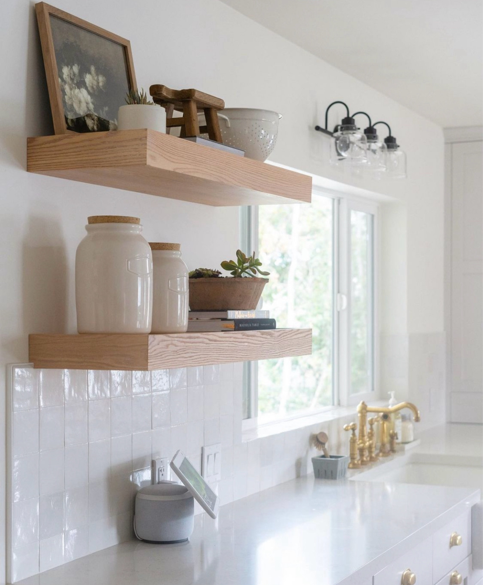 Open white oak shelving in white kitchen with brass accents 

#LTKhome