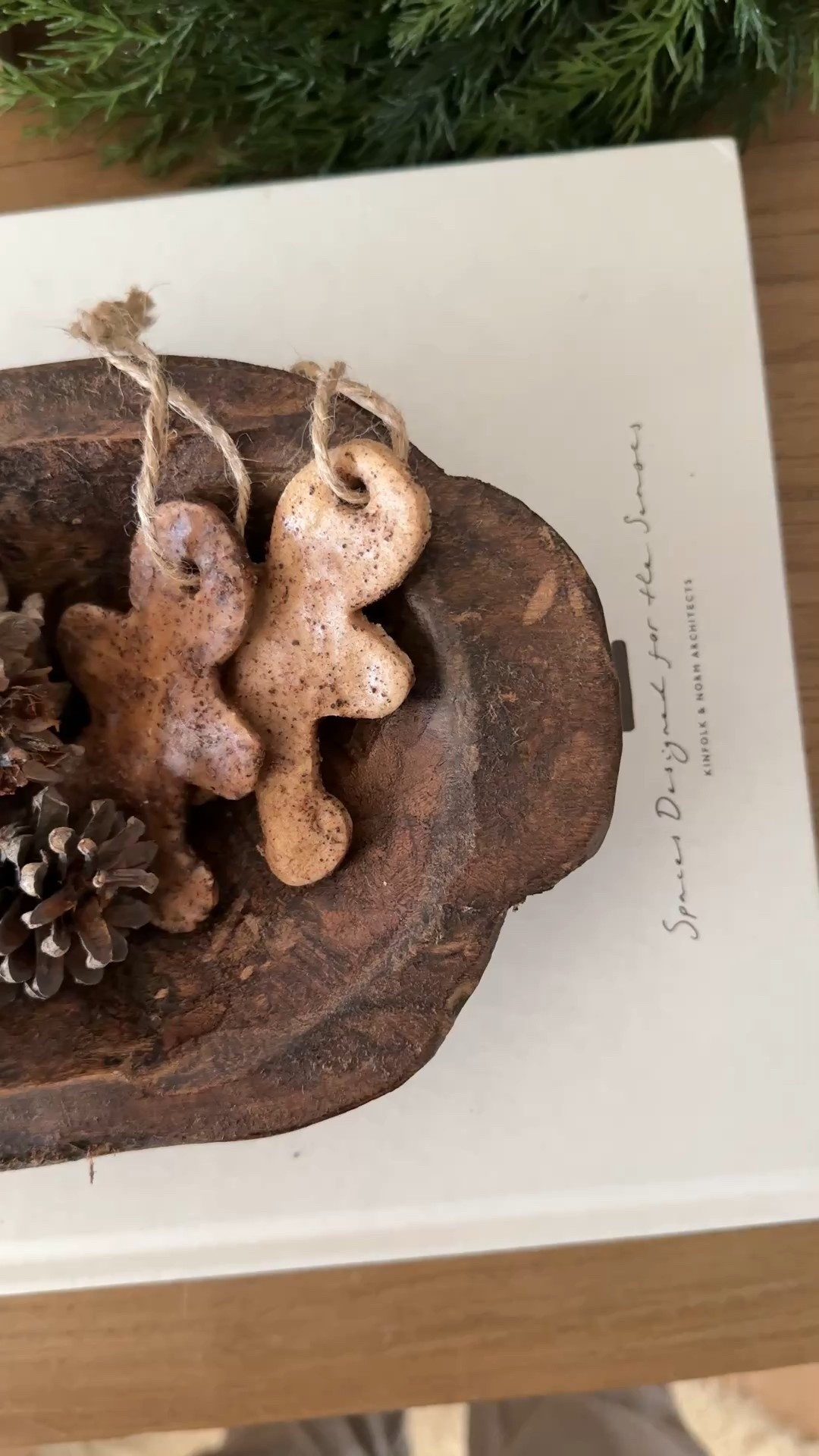 My favorite wood catch-all bowl — I swear I have one in every room. The tone is chef’s kiss, and this time of year it’s extra beautiful filled with pinecones or little bells. And those tiny gingerbread ornaments? My momma made them, and they’re just too cute 🥰 

#LTKholiday #LTKsale #LTKhome