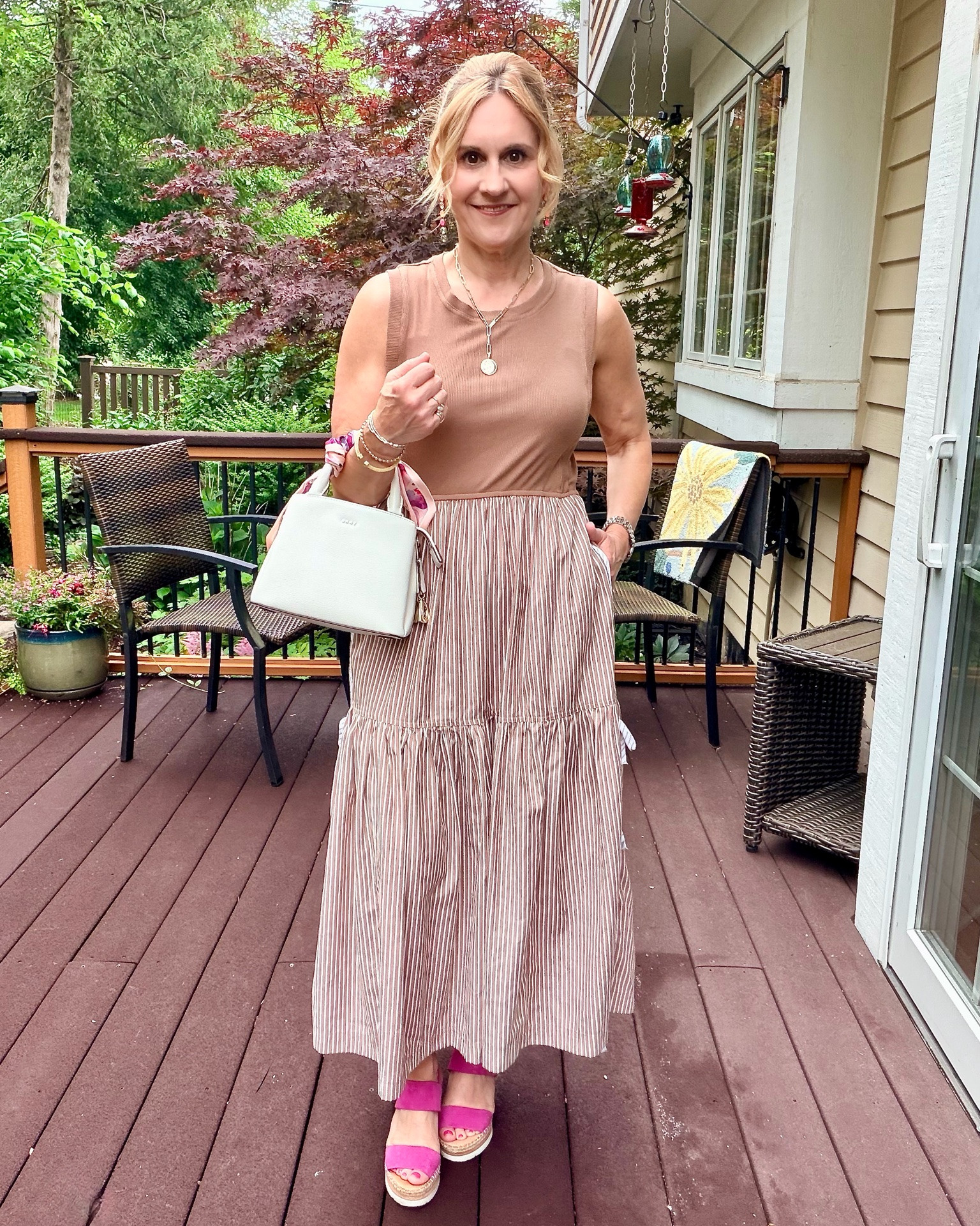 Staying summer comfy chic in this neutral mixed media dress. 👗 Adding a pop of pink to the these stripes and side bows details with my sandals. How do you stay stylish during this hot summer? ☀️

#LTKootd #LTKOver40 #LTKPetite