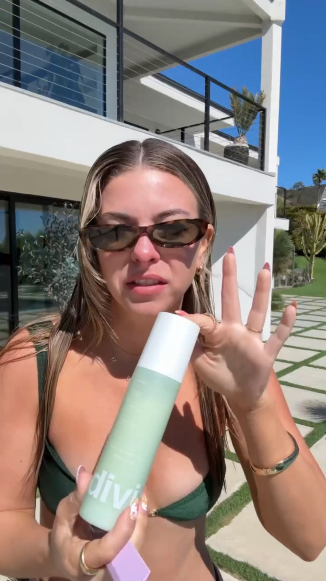 Green bikini swimwear for beach vacation travel summer destination swim look Divi 3 in 1 leave in conditioner. 

Wearing a small top and medium bottom 