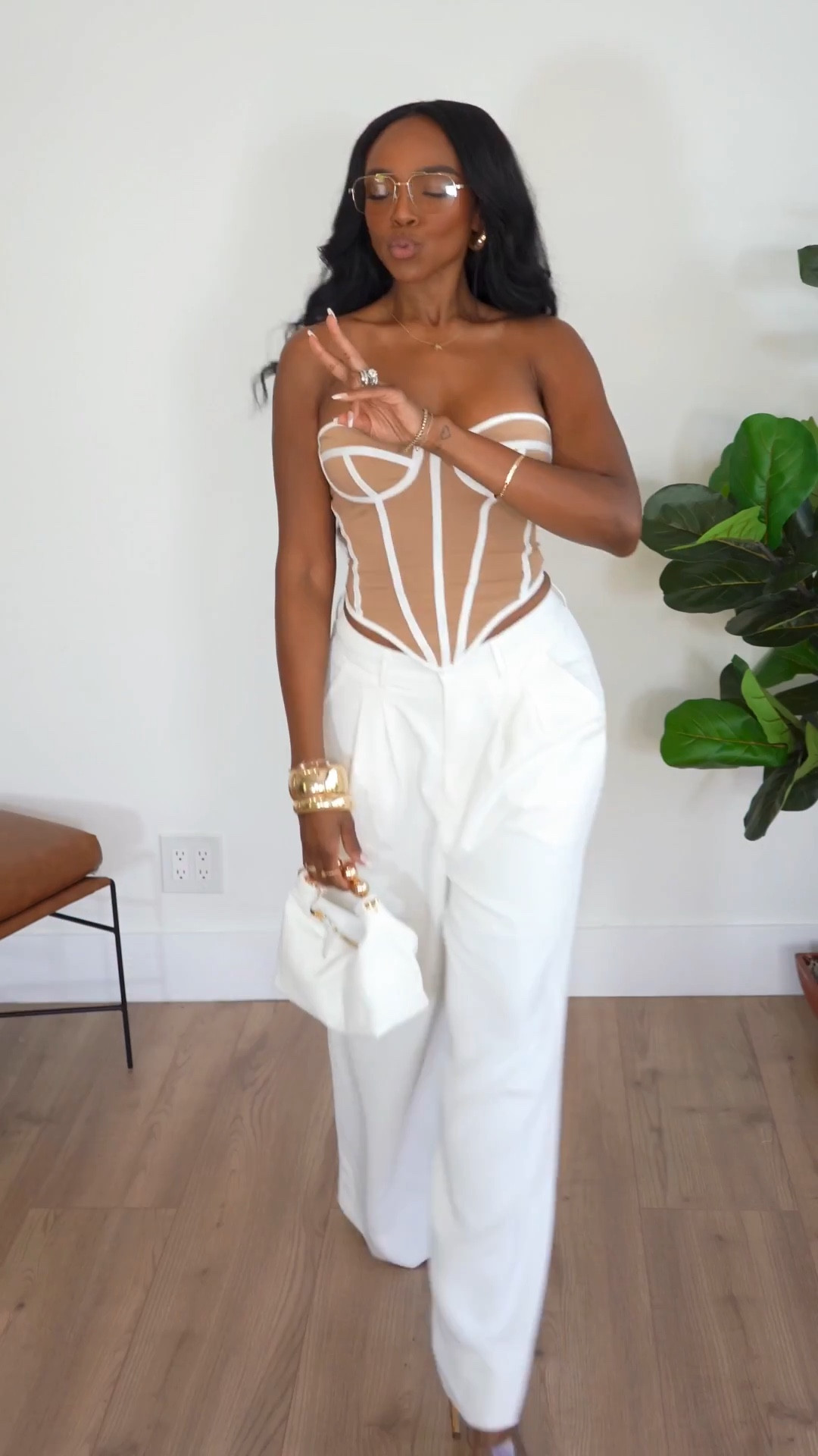 Scroll to shop this elevated neutral outfit featuring a structured corset top styled with high-waisted wide-leg trousers for a bold yet sophisticated look. Corset styling is trending right now and pairs perfectly with tailored trousers, making it ideal for spring outfits 2026 and statement date night outfits while keeping the cost per wear low since each piece can be styled multiple ways.

Perfect for dinner dates, vacation nights out, rooftop drinks, or elevated evening outfits.

5'4" | 138 lbs | 34D bust | 27" waist | 40" hips

#LTKootd #LTKvlog