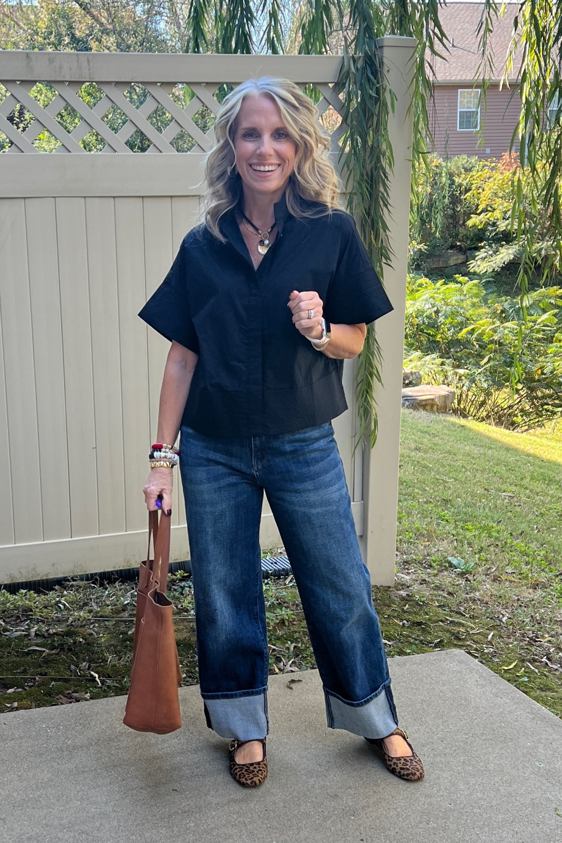 Warm fall day styling 
Love the swingy cropped style of this top. Wearing XS. Comes in several colors 
Wearing size 2 jeans. They run BIG 
Tote is so good and on sale 

#LTKOver40 #LTKSaleAlert #LTKStyleTip