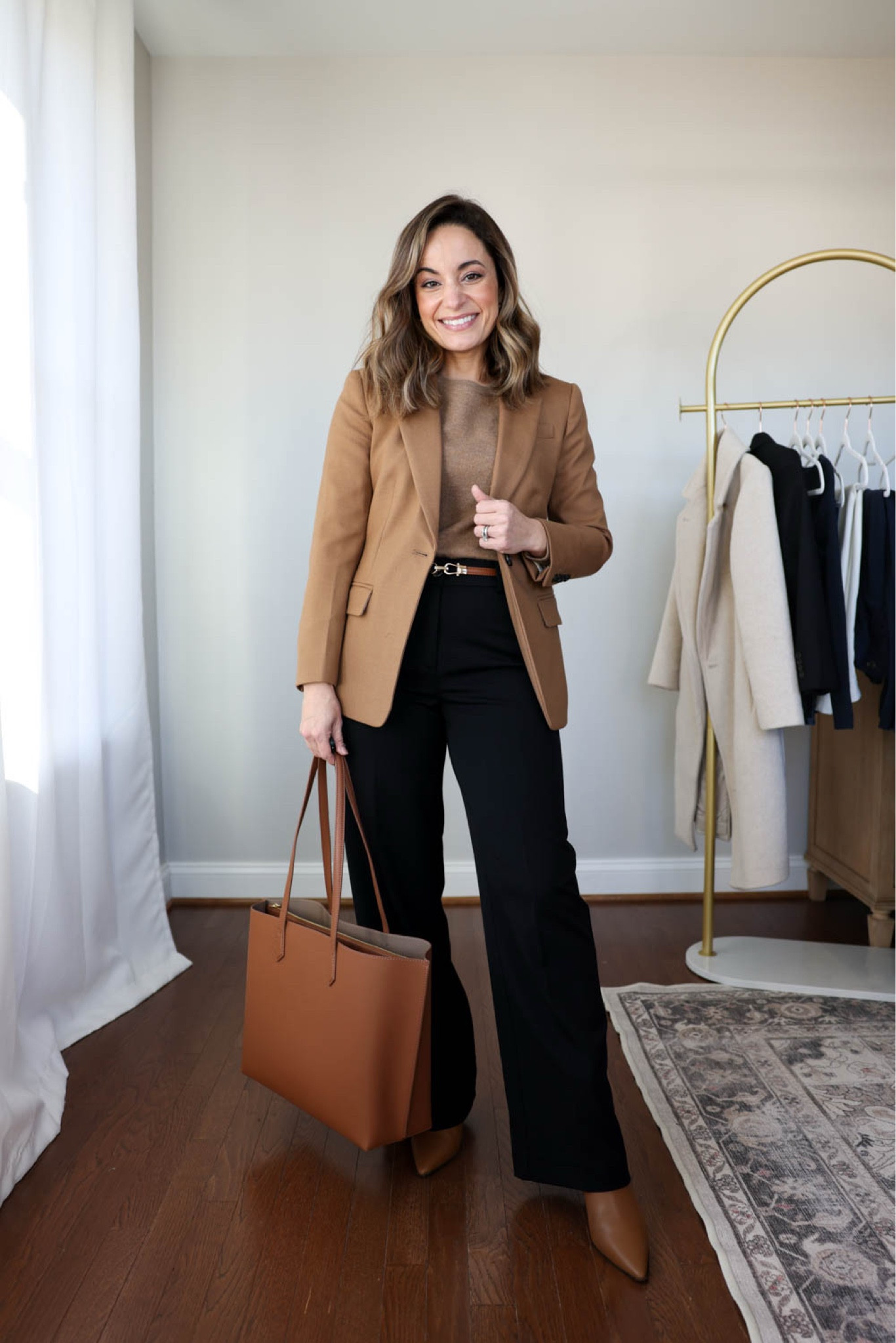 Winter workwear capsule series: black pants six ways 

This capsule has 16 pieces (not including shoes and bags) and 30 outfits! 

Camel blazer (j.crew): petite 00 
Camel sweater (quince): xs teak 
Black pants (Ann Taylor): petite 00 
Tan boots are sold out (but linked in case they restock) 

My measurements for reference: 4’10” 105lbs bust, waist, hips 32”, 24”, 35” size 5 shoe. 25” inseam measurement to my ankle bone.