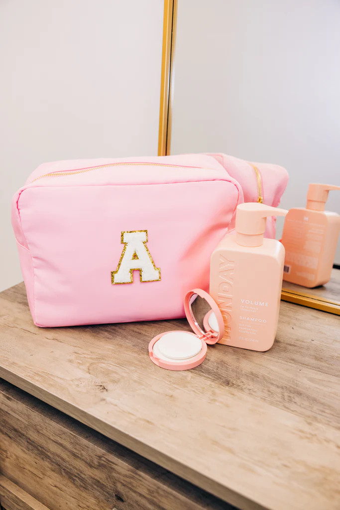 Pre-Order: Let's Get Going Baby Pink Varsity Cosmetic Bag, X-Large | The Mint Julep Boutique
