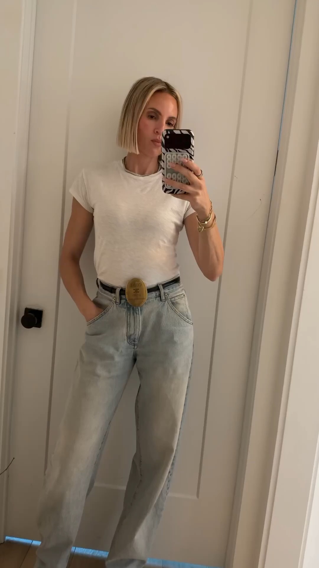 The belt is sold out, but I linked two different versions of it below. My jeans are one of my favorite jeans that I own. Tall girl friendly. They run TTS. wearing a small in the tee￼