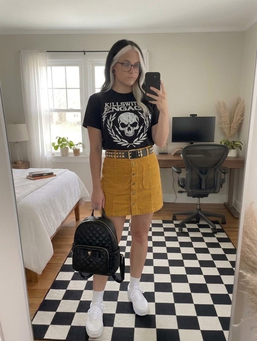 Obsessed with this cool and edgy outfit! I'm wearing a vintage Killswitch Engage graphic band tee, a mustard yellow corduroy button-up skirt, and white platform sneakers. I accessorized with a black studded leather belt and a cute quilted bow backpack. This look is perfect for a concert, casual hangouts, or just making a statement.

#LTKootd #LTKSeasonal #LTKMidsize