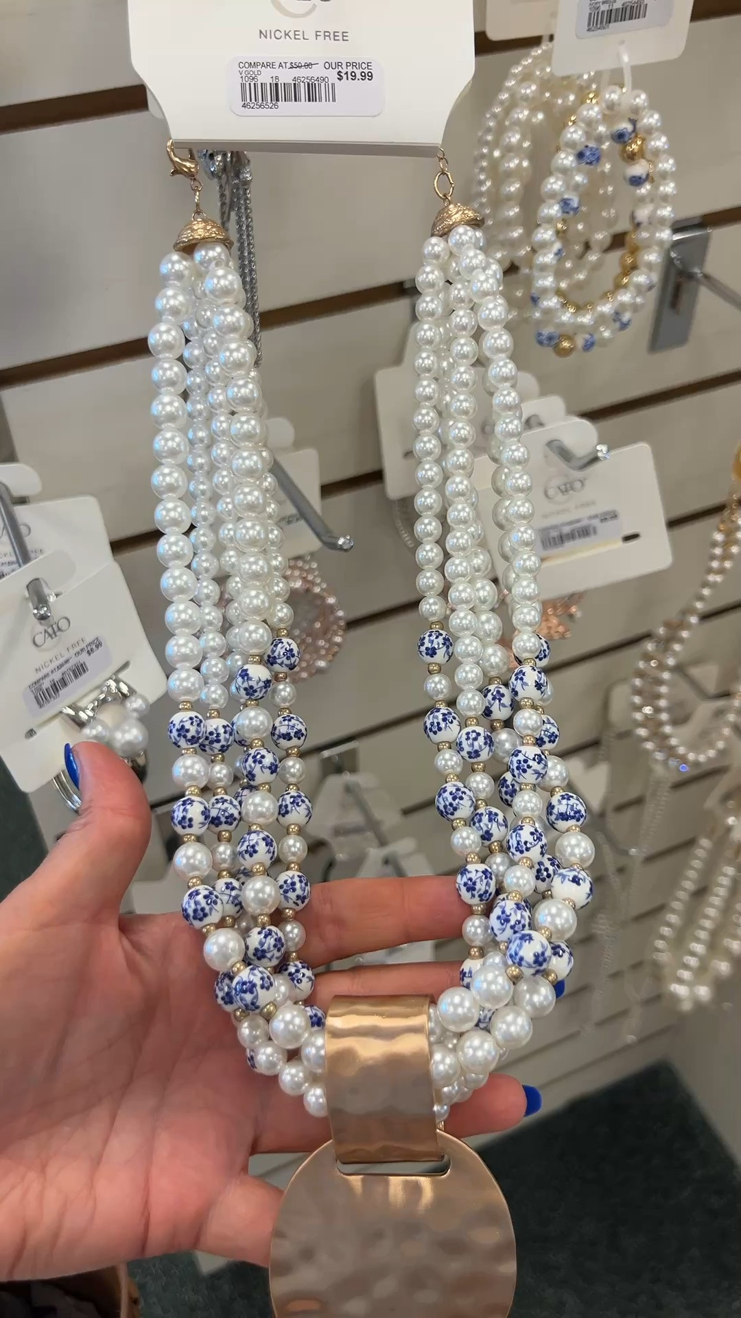 Multi strand pearl necklace with blue and white beads and large gold medallion statement necklace

#LTKootd #LTKOver40 #LTKWorkwear