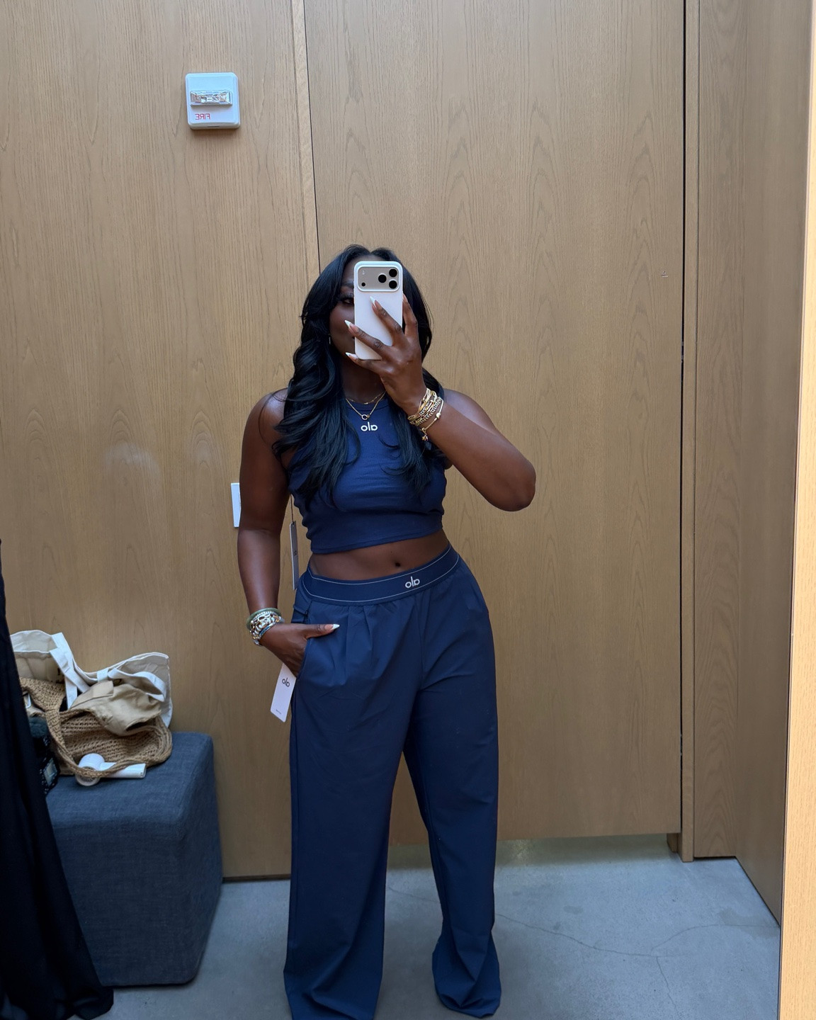 Wearing a medium in the tank top and large in this ALO outfit.