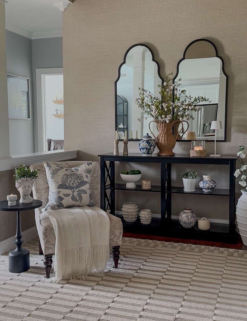 Spring to summer entryway! Shop neutral area rug, hydrangeas throw pillows, woven, rattan vase, florals, blue and white vases, temple jar, candleholders, textured minka vases, and more home decor accessories. 

#LTKHome #LTKFindsUnder50 #LTKStyleTip