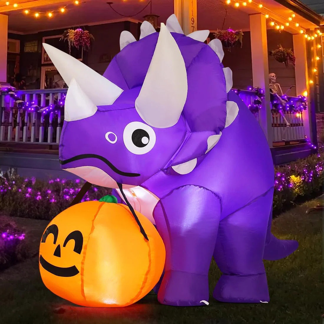 5 FT LED-Lit Halloween Inflatable Triceratops Dinosaur with Pumpkin in Mouth | Wayfair North America
