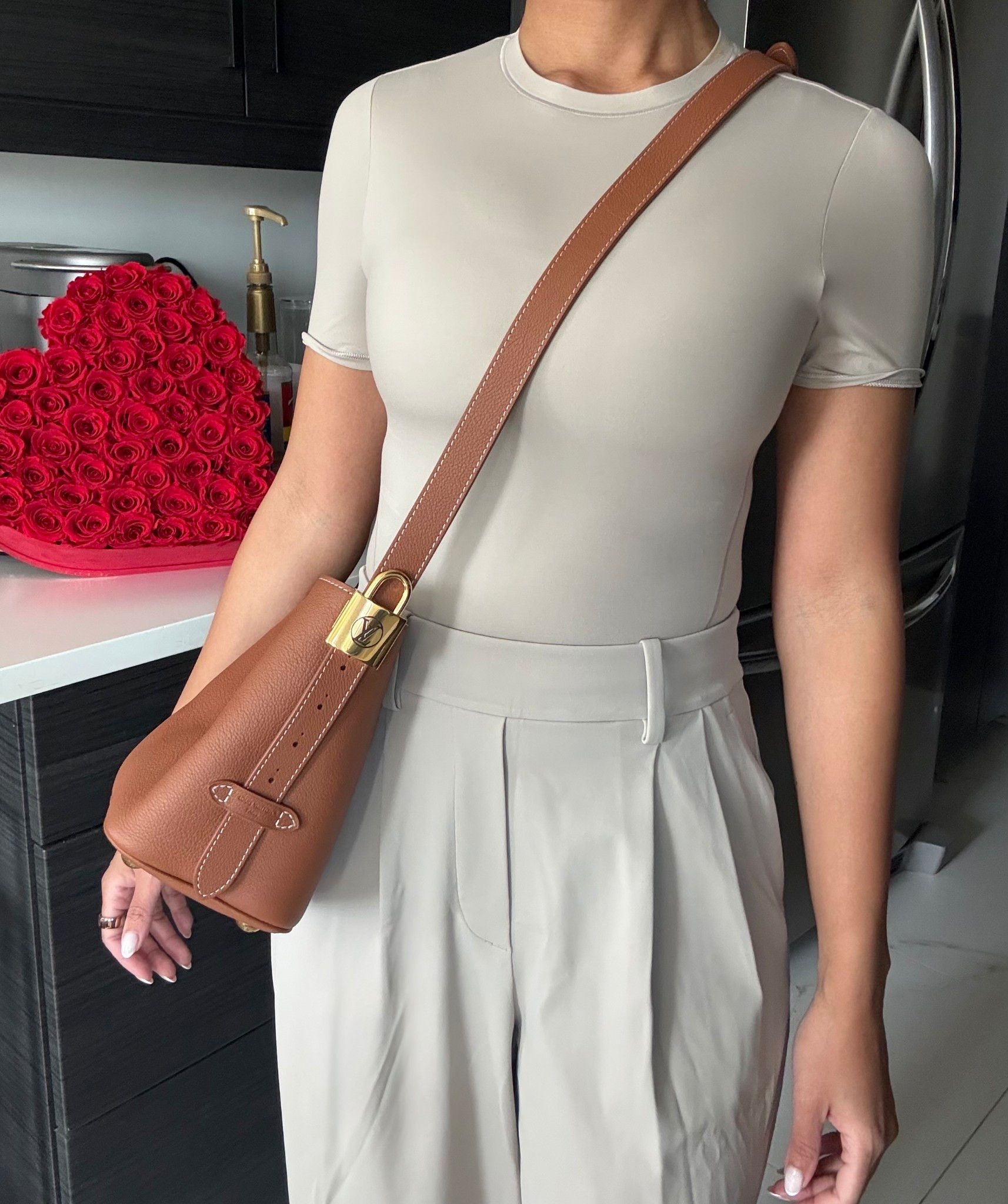 an all downtown tan lululemon outfit ! 🤍 

lowkey all in bb in cognac, Louis Vuitton, luxury handbags, daydrift wide leg trouser, wundermost short sleeve t shirt, petite, travel, workwear, athleisure. 

#LTKPetite #LTKootd #LTKTravel